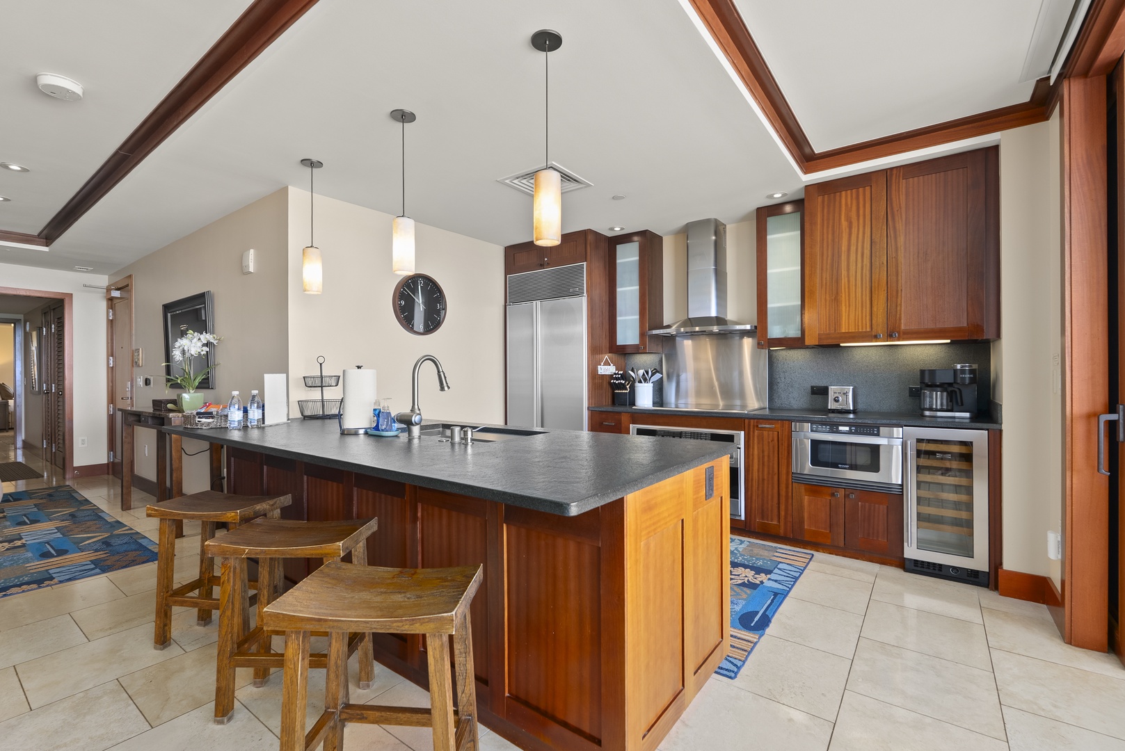 Kapolei Vacation Rentals, Ko Olina Beach Villas O1404 - A wine fridge tucks in beside the range, chilled and ready for the evening.
