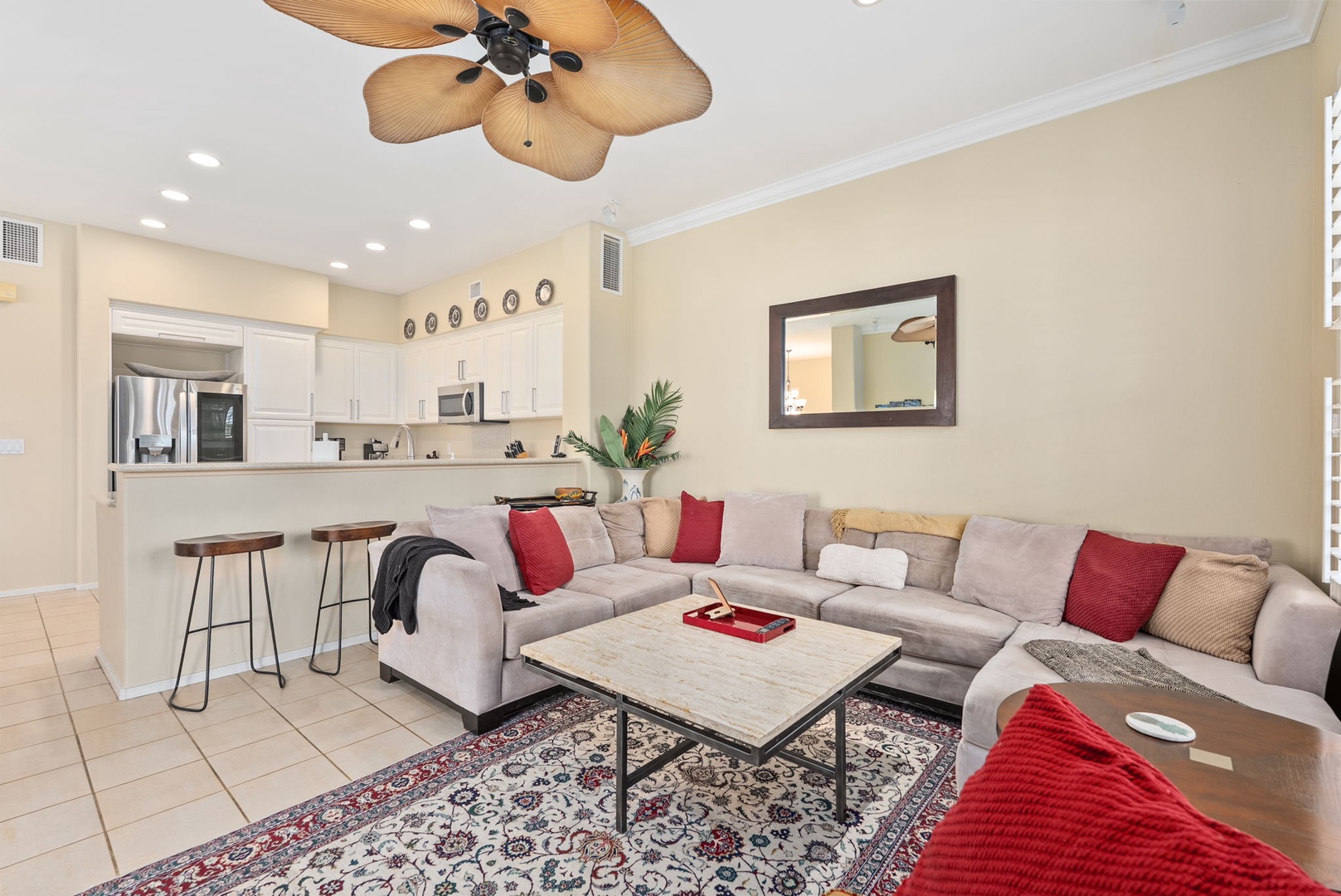 Kapolei Vacation Rentals, Coconut Plantation 1080-4 - Sink into the sectional in a living room that opens straight to the kitchen.