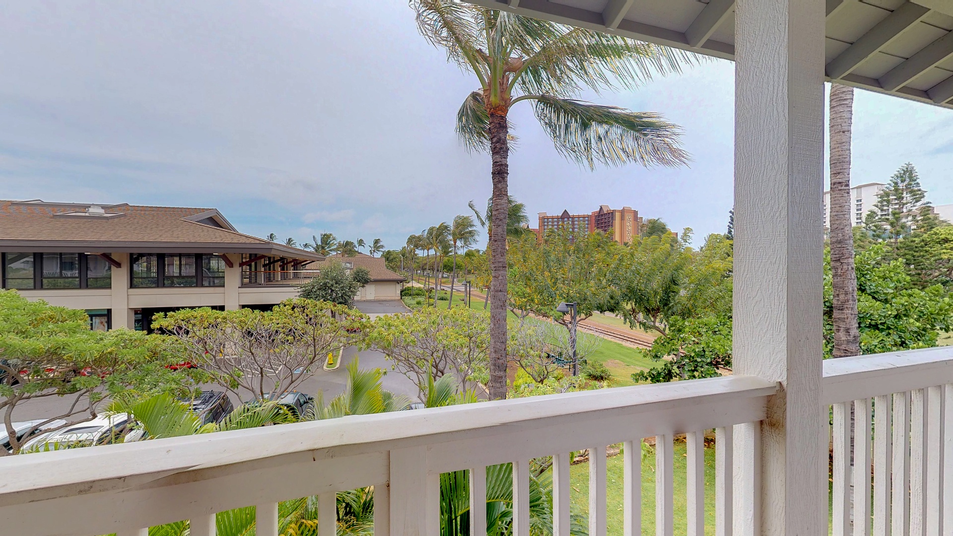 Kapolei Vacation Rentals, Coconut Plantation 1080-1 - A second floor view toward Disney's Aulani from the lanai.