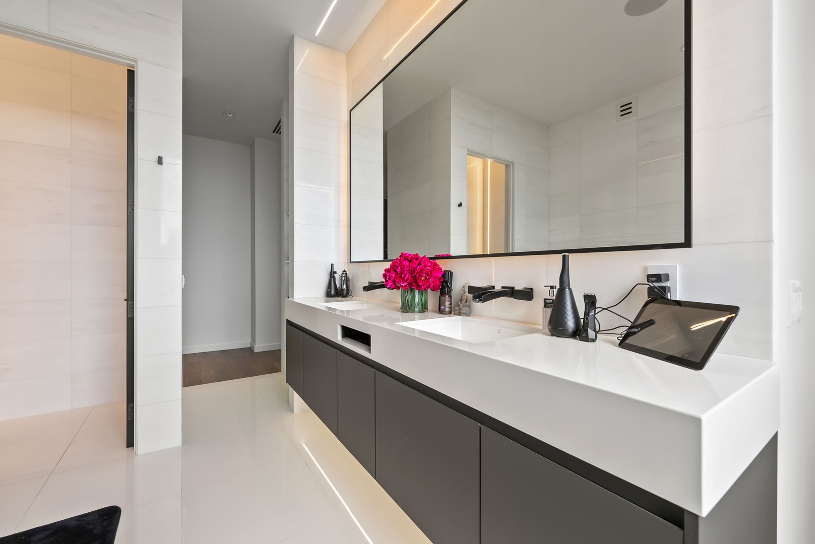Honolulu Vacation Rentals, Ocean Villa Emilie - A dual-sink vanity with built-in lighting and modern fixtures—perfect for getting ready together in style.
