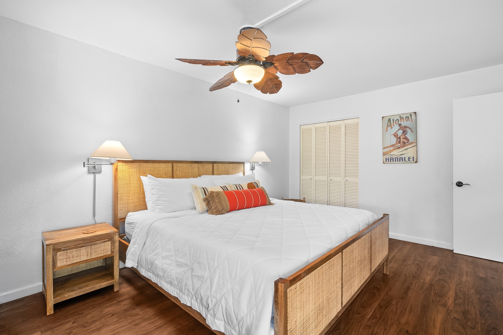 Princeville Vacation Rentals, Mauna Kai 7B - Wake up easy in a main-level bedroom, ceiling fan turning overhead.
