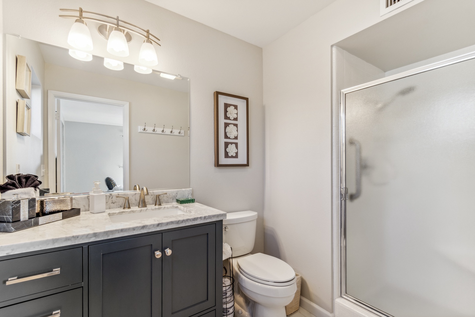 Mesa Vacation Rentals, Private Putting Oasis - The bathrooms are newly renovated and include luxurious touches like rainfall shower heads.