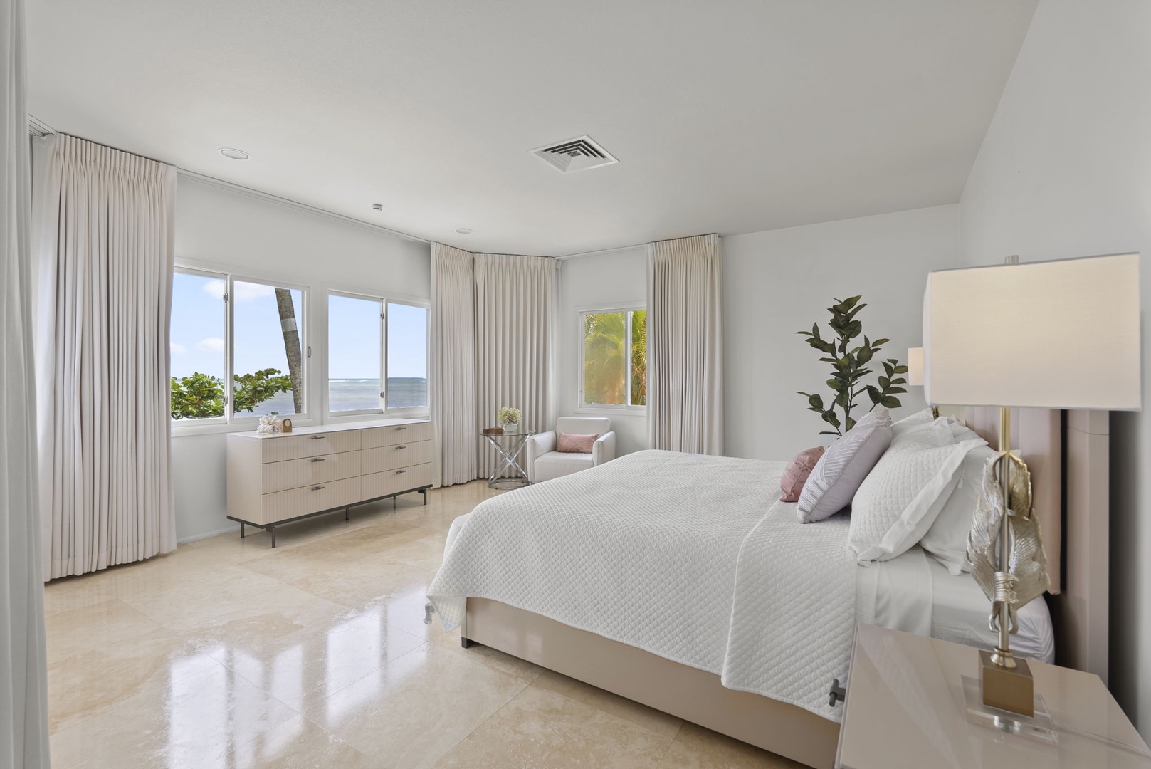 Honolulu Vacation Rentals, Paradise Beach Estate - The ocean-facing primary suite offers panoramic views, marble flooring, and direct access to luxury indoor-outdoor living.