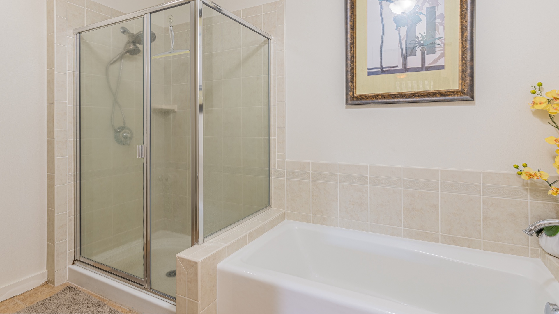 Kapolei Vacation Rentals, Kai Lani 8B - The primary guest bathroom with a shower and tub for soaking.