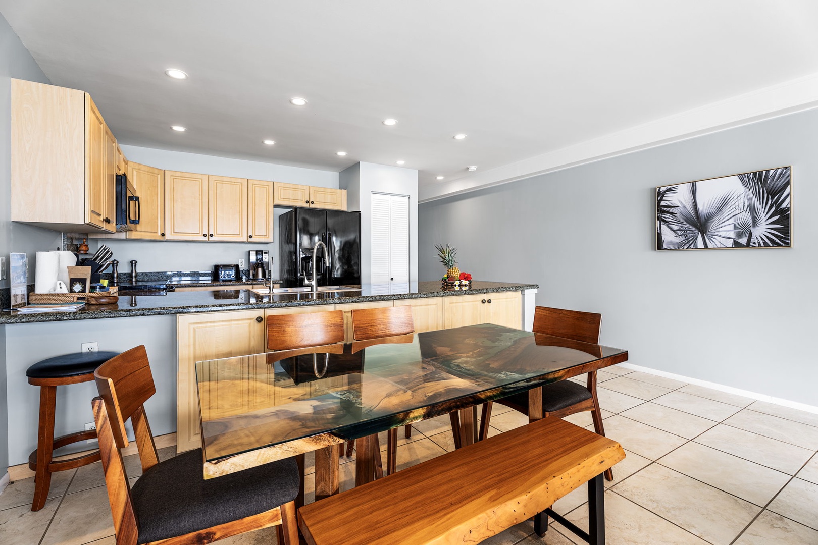 Kailua Kona Vacation Rentals, Sea Village 1105 - Dining area seats six and opens directly to the kitchen and living space—perfect for group meals or game nights.