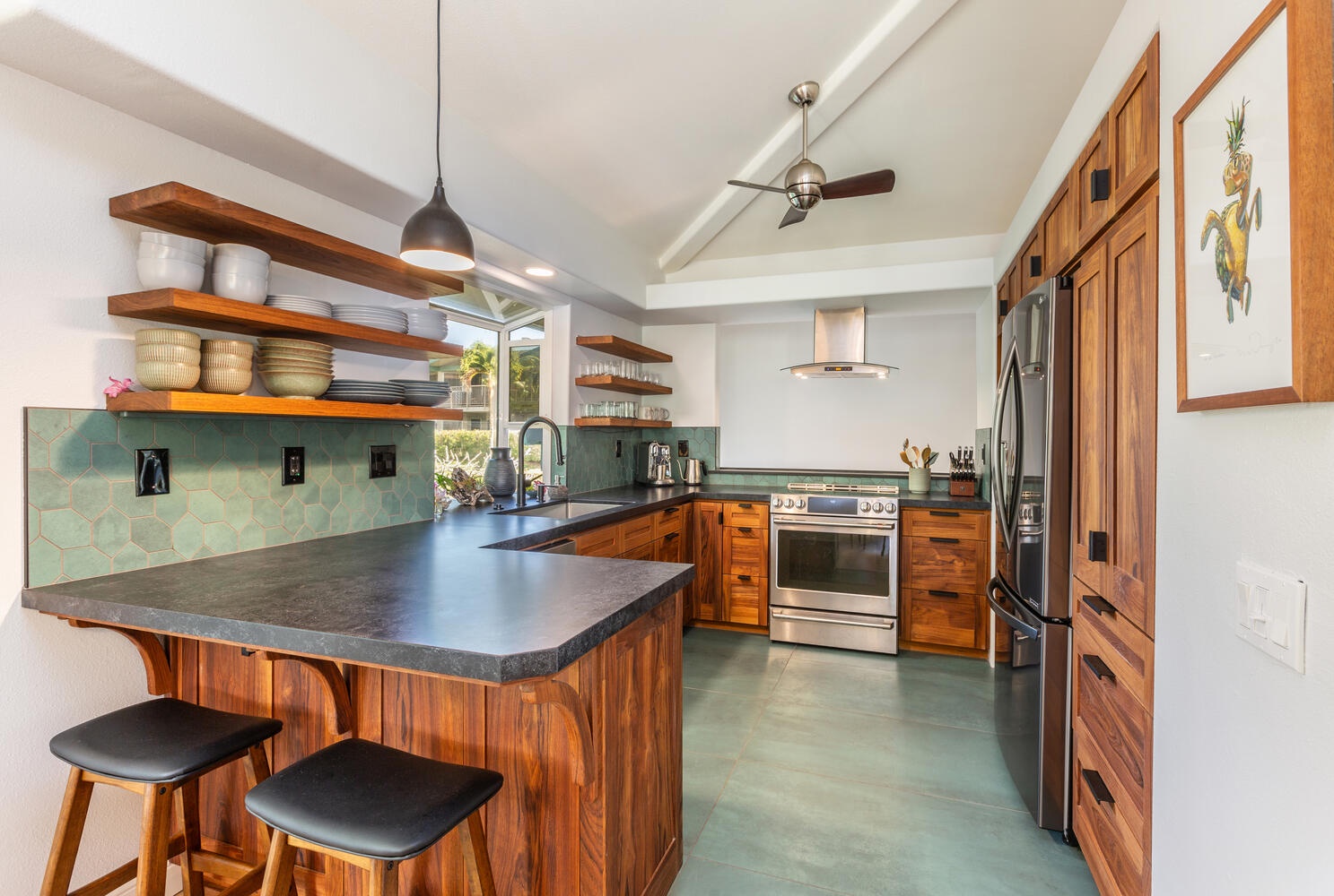 Princeville Vacation Rentals, Sea Glass - The kitchen, the heart of the home, is equipped with wide counter spaces and top of the line appliances.
