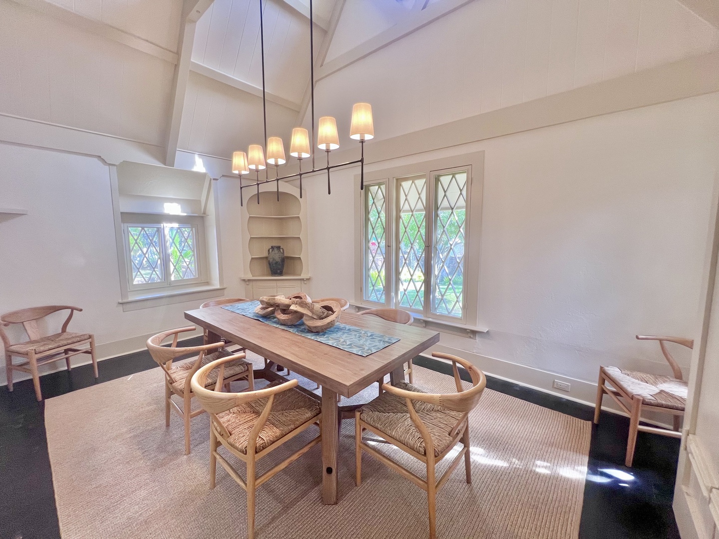 Honolulu Vacation Rentals, Kahala Palms - Elegant dining room with seating for 6, featuring warm lighting and charming interiors for memorable meals