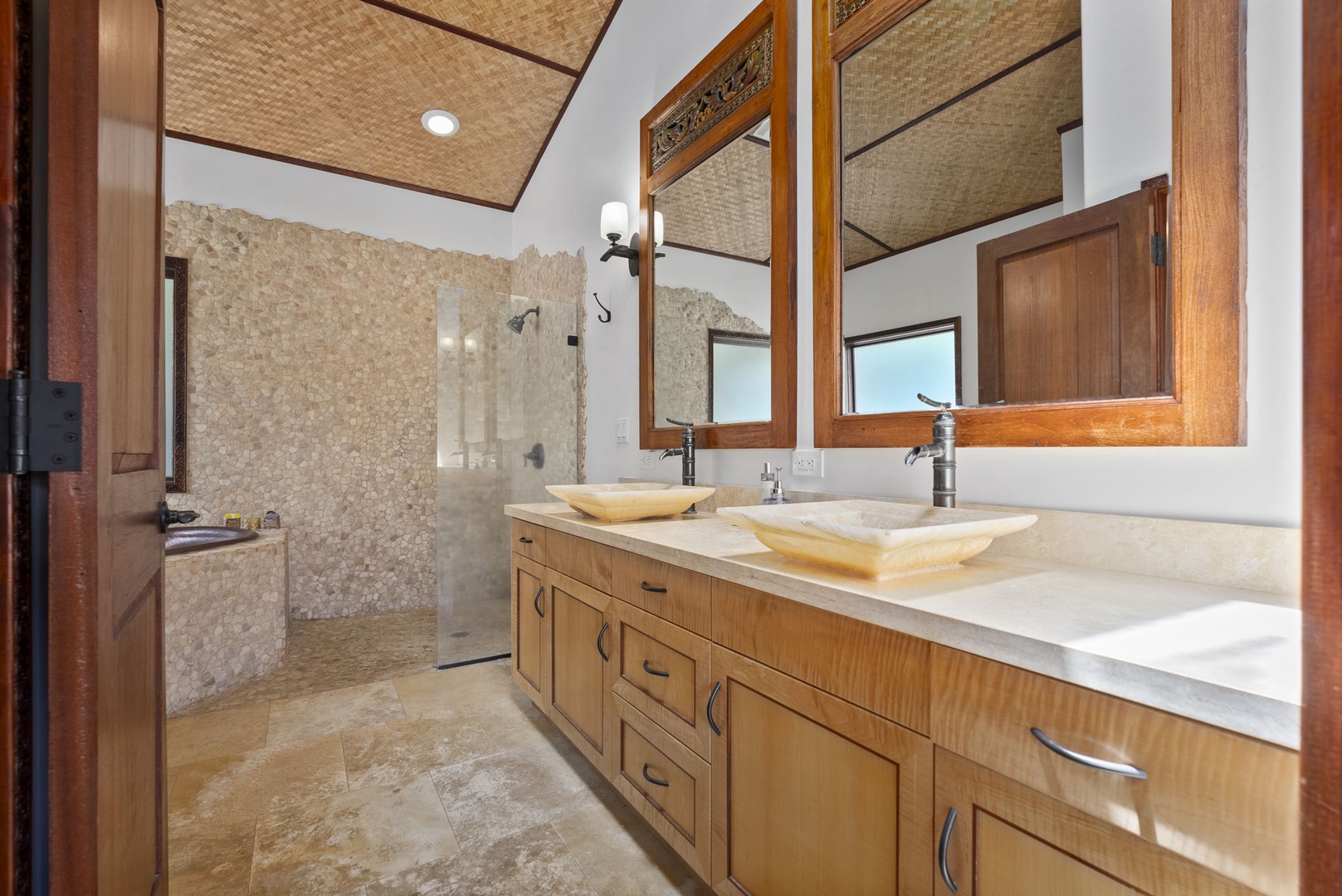 Haleiwa Vacation Rentals, Kealoha Tropical Beach Villa - The bathroom has dual vanity spaces and a separate walk-in shower.