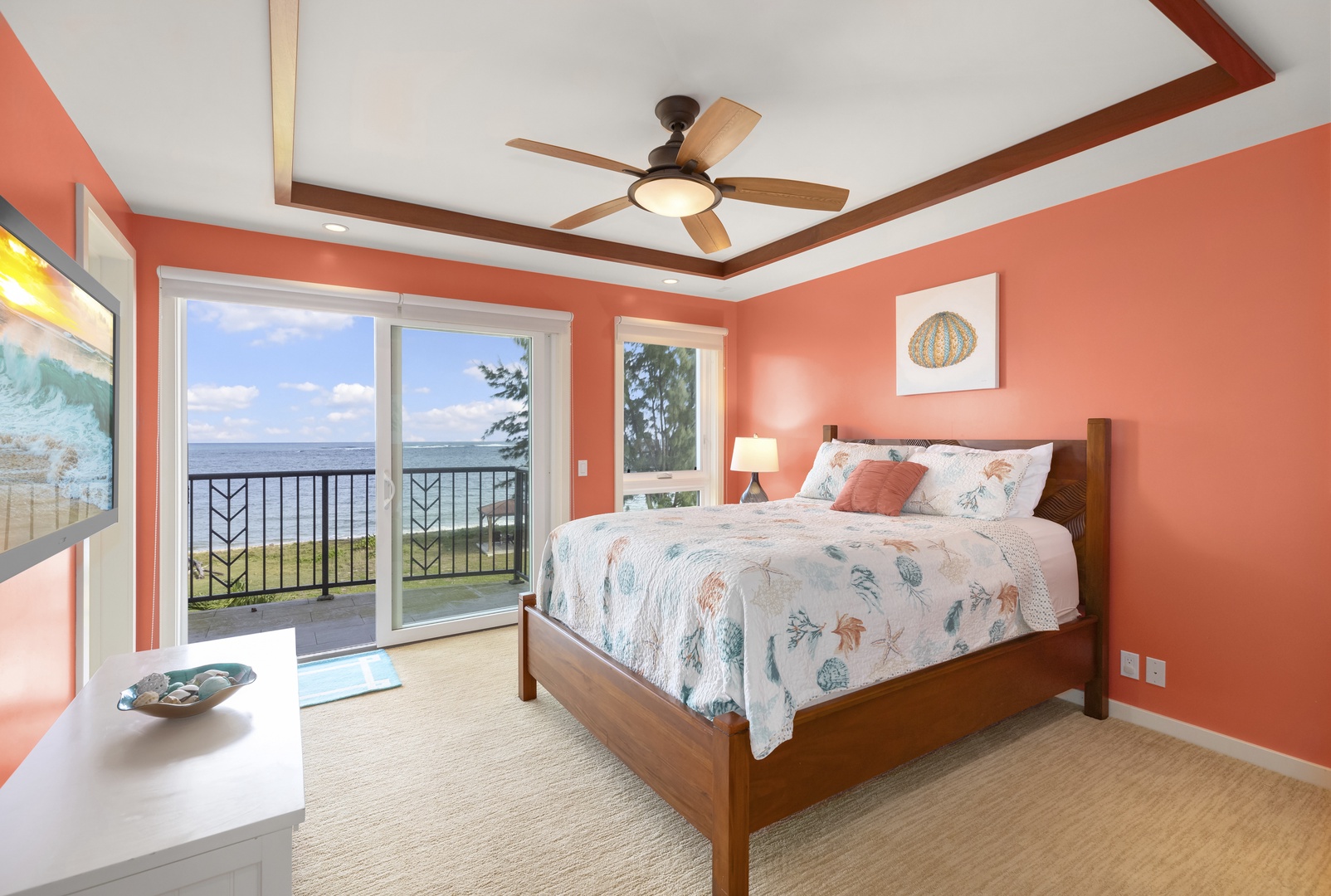 Waialua Vacation Rentals, Waialua Beachfront Estate - The third and fourth bedrooms, which share a Jack-and-Jill bathroom, each have a double bed, lanai with mountain views, television, and desk