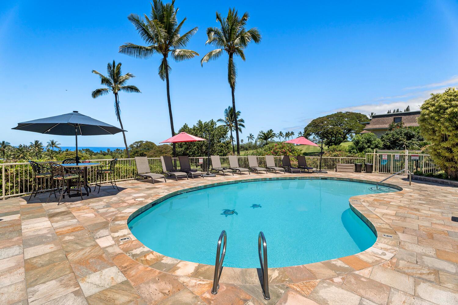 Kailua Kona Vacation Rentals, Keauhou Akahi 302 - Enjoy the tropical views by the pool.