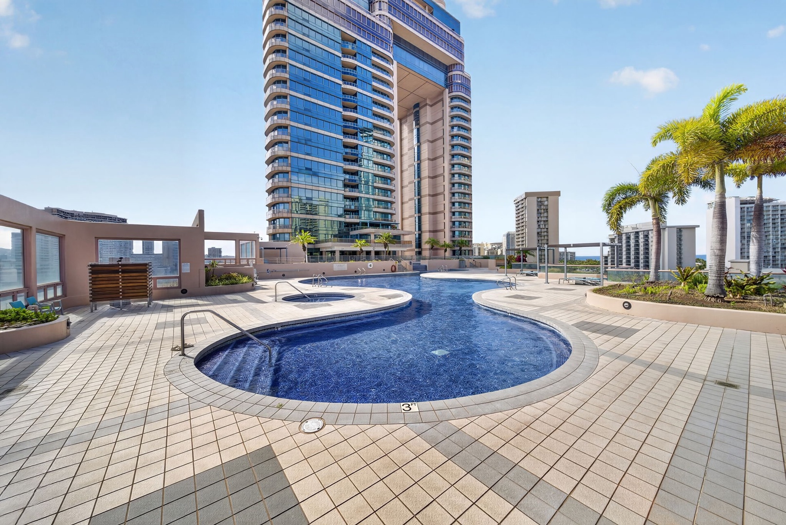 Honolulu Vacation Rentals, Island View at Waikiki Landmark - Swim beneath Honolulu’s skyline in the resort-style rooftop pool and spa area.