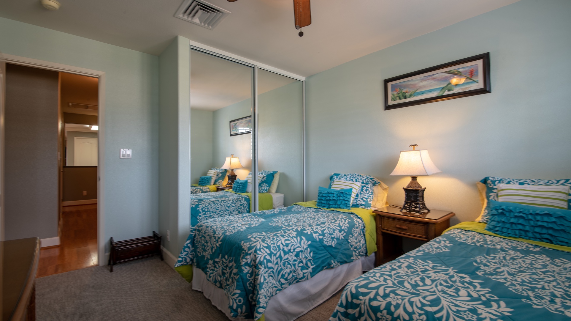 Kapolei Vacation Rentals, Ko Olina Kai 1047B - The third guest bedroom has a TV and ceiling fan.