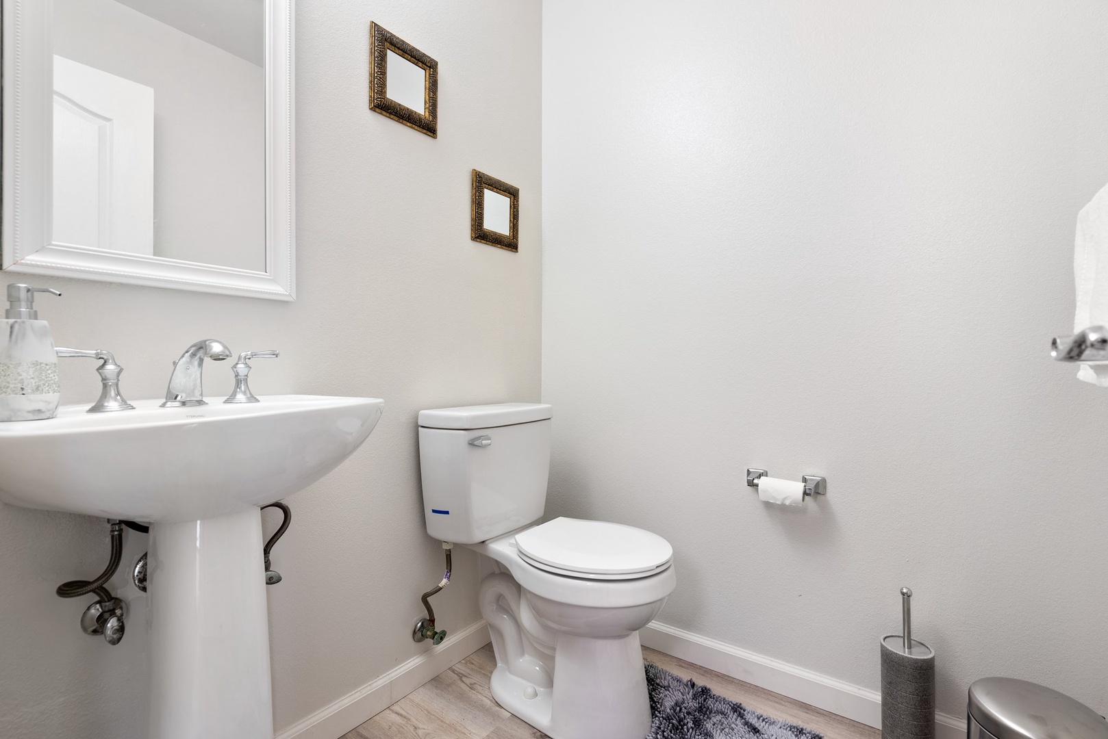 Kapolei Vacation Rentals, Kilipue Retreat - Convenient half bathroom on the main level for guests and quick access.