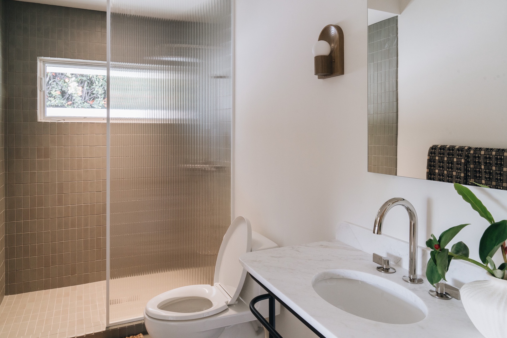 Honolulu Vacation Rentals, Surfside Bungalow** - Clean lines and modern finishes create a bright, refreshing space to start and end your day.