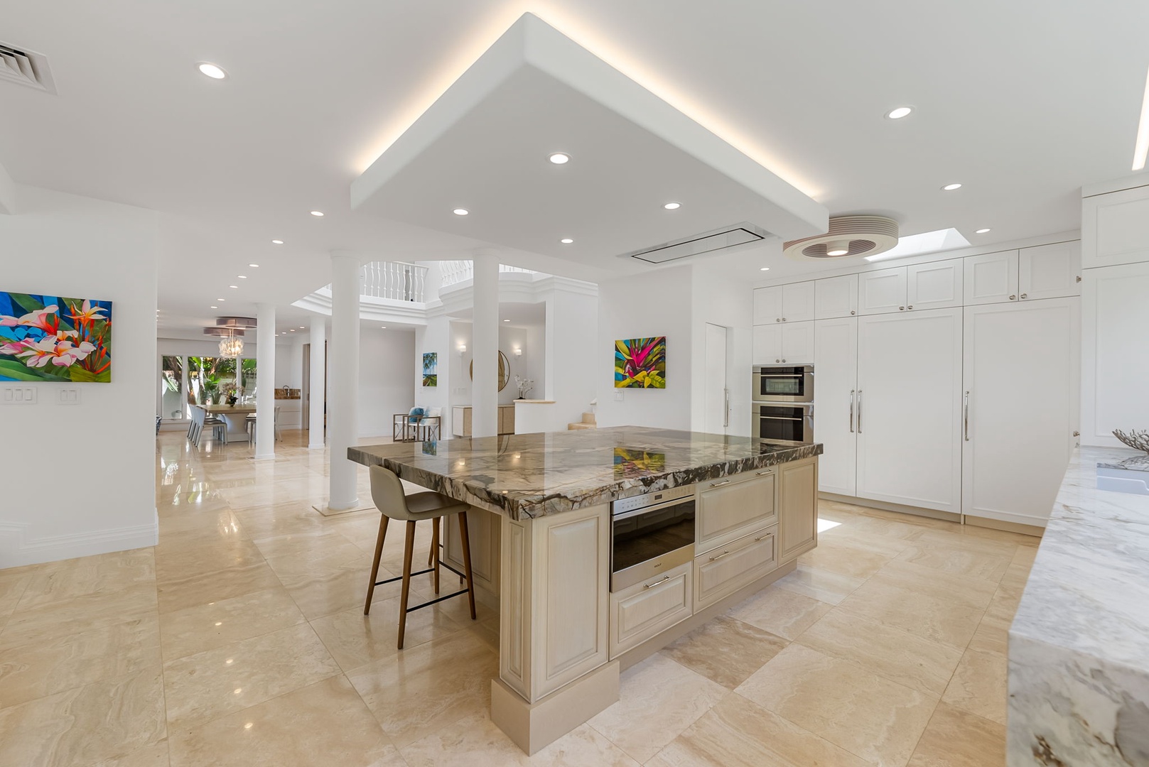 Kailua Vacation Rentals, Lanikai Sunrise Estate - Sleek, modern kitchen with high-end appliances and open shelving—perfect for preparing island feasts.