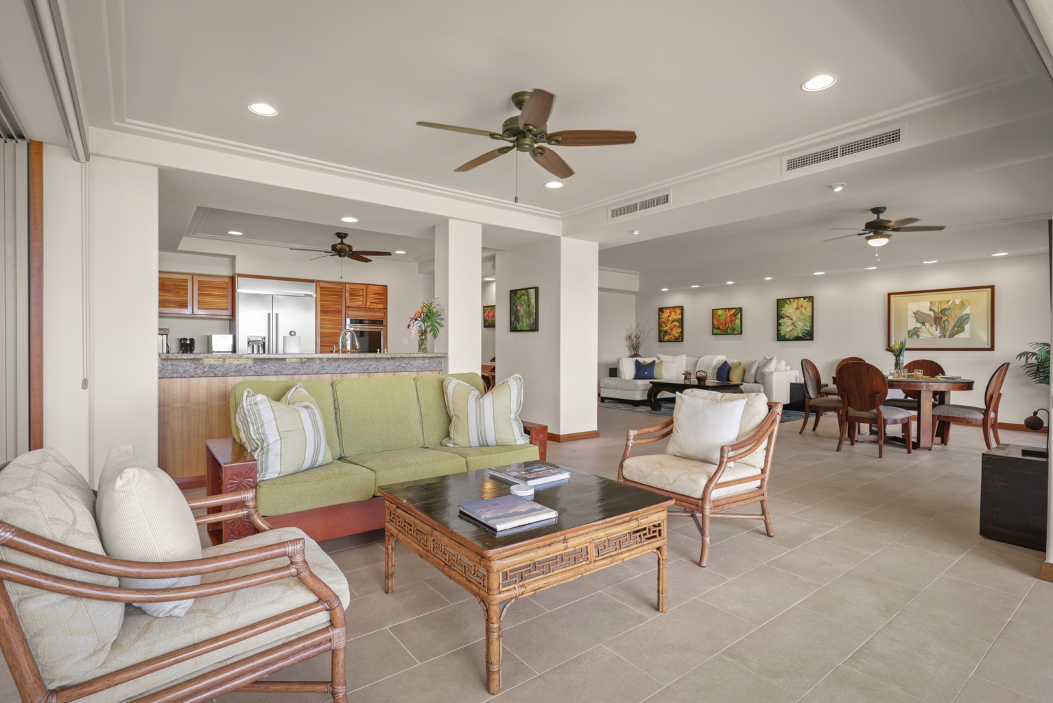Kailua Kona Vacation Rentals, 3BD Golf Villa (3101) at Hualalai Resort - Alternate view of seating area into gourmet modern kitchen.