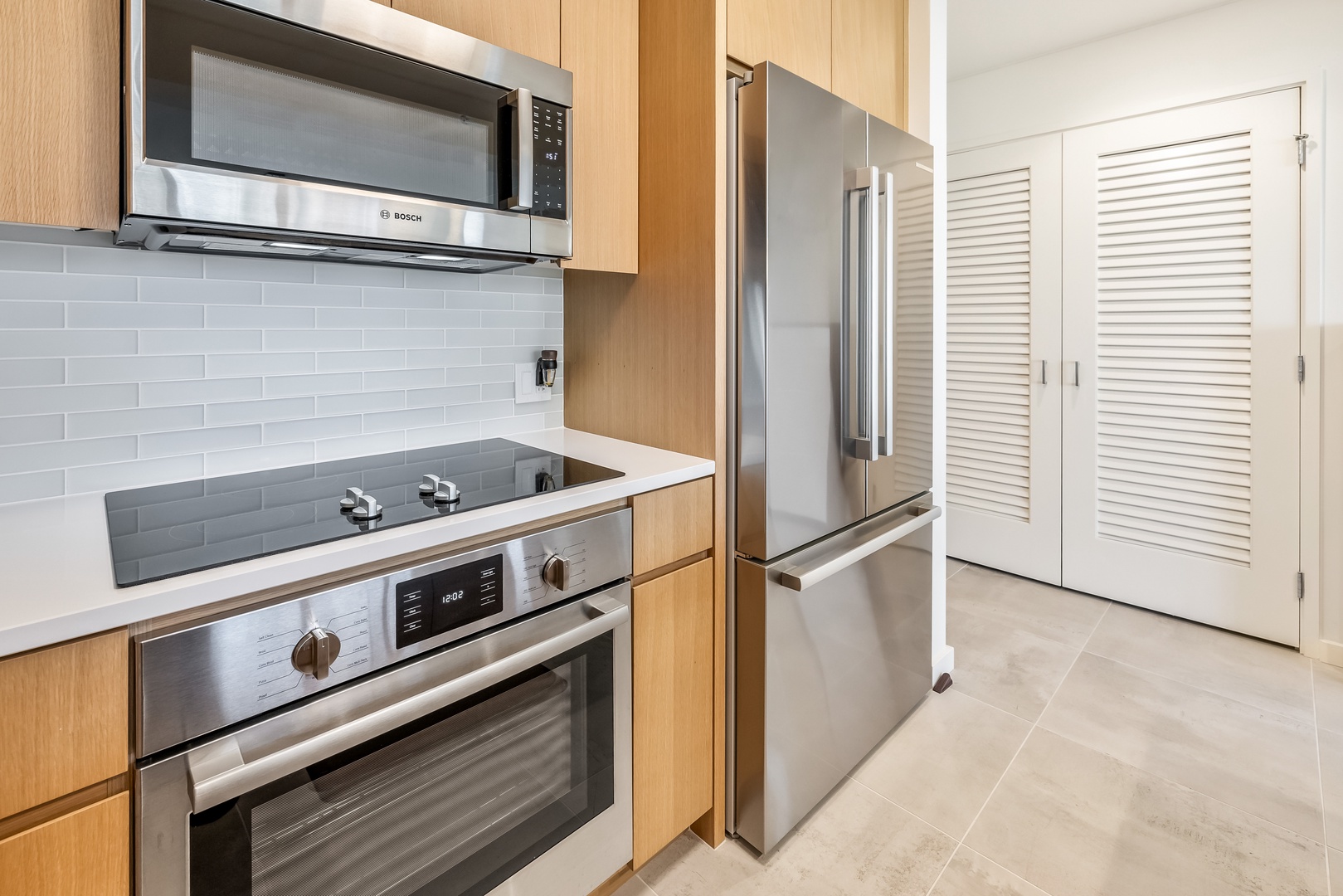 Honolulu Vacation Rentals, Sky Ala Moana #1701 - The kitchen features top-tier stainless steel appliances.