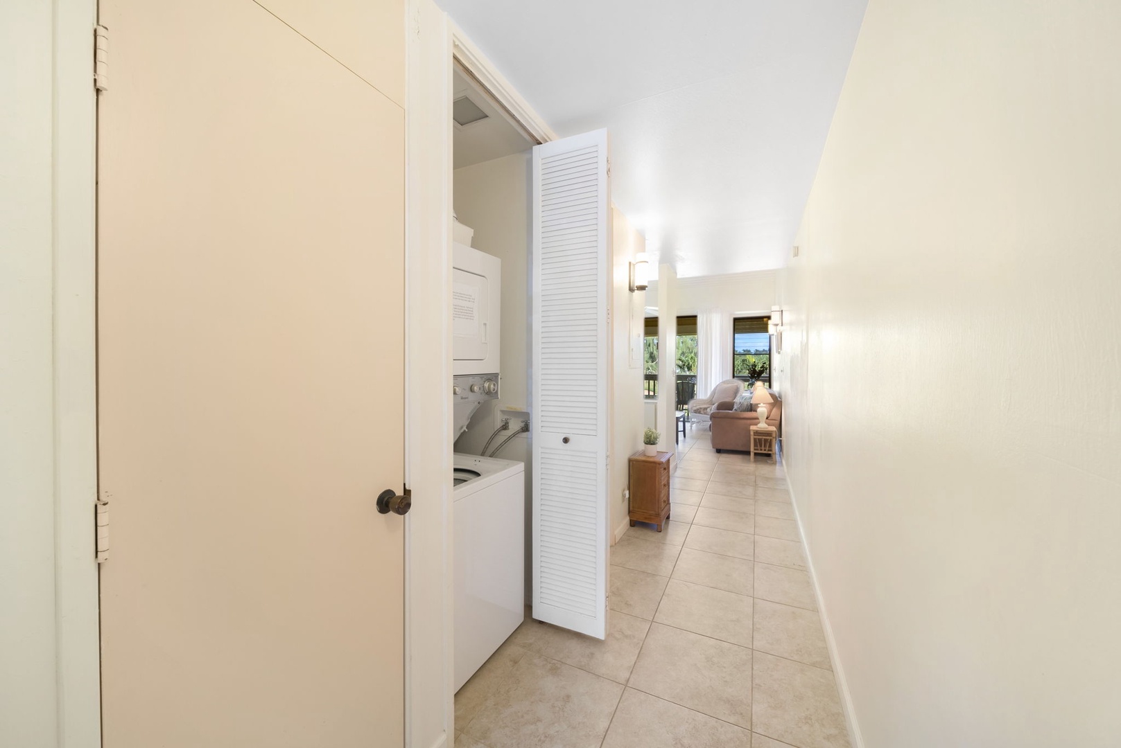 Kahuku Vacation Rentals, Kuilima Estates East #164 - Hallway with in-unit washer/dryer