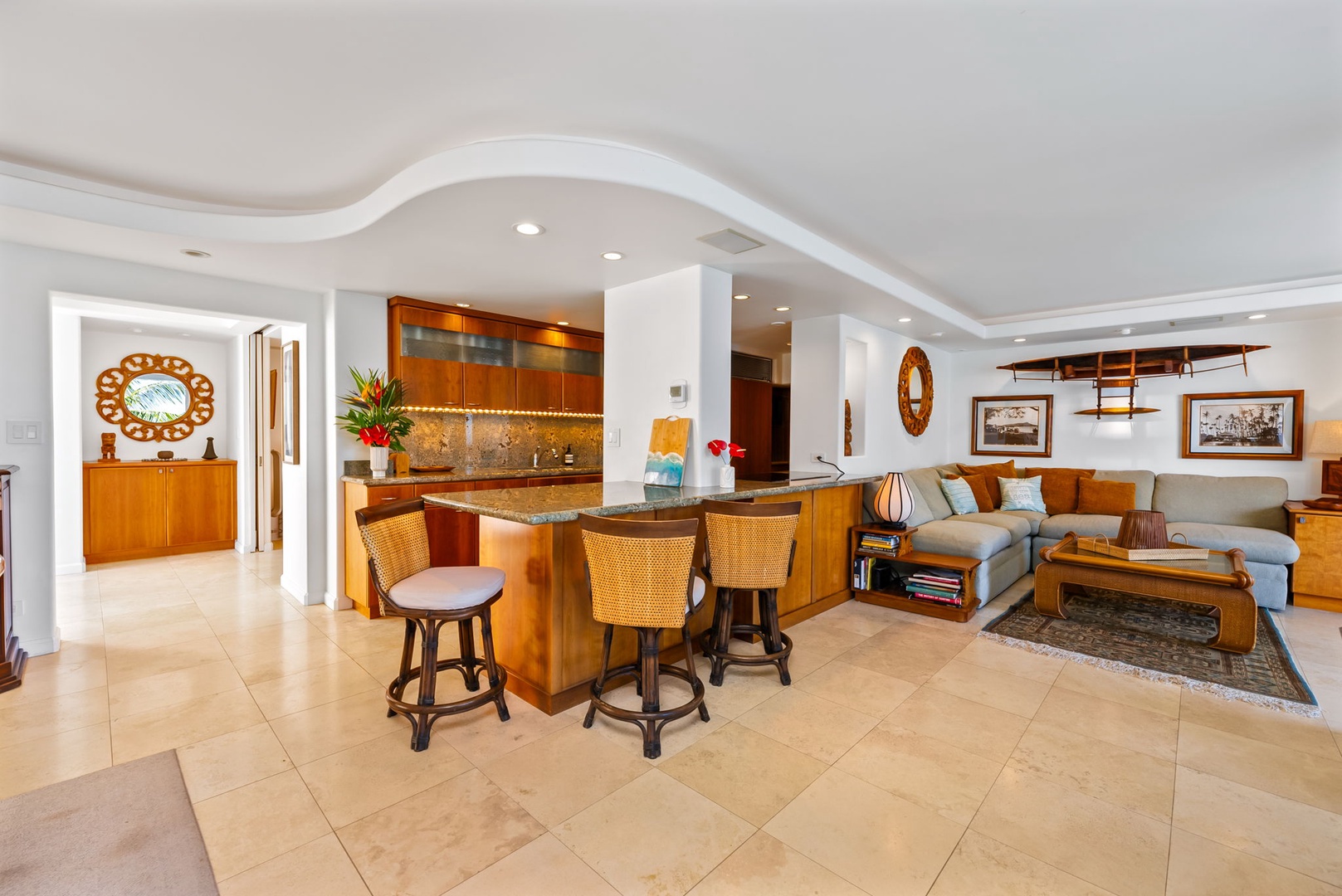 Honolulu Vacation Rentals, Kaimana Views - Comfortable and stylish living area with inviting decor and plenty of space for gathering with friends or family.