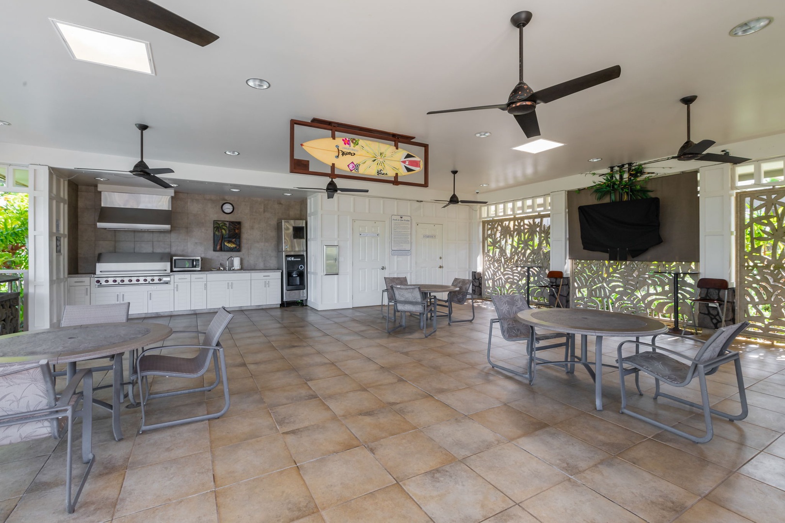 Princeville Vacation Rentals, Kaiulani #8 - Grill for a crowd in the covered pavilion kitchen, ceiling fans turning overhead.