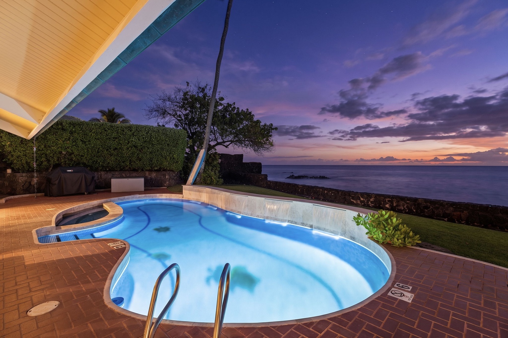 Kailua Kona Vacation Rentals, Hale Pua - Slip into the pool at twilight, with soft light and the ocean just beyond.