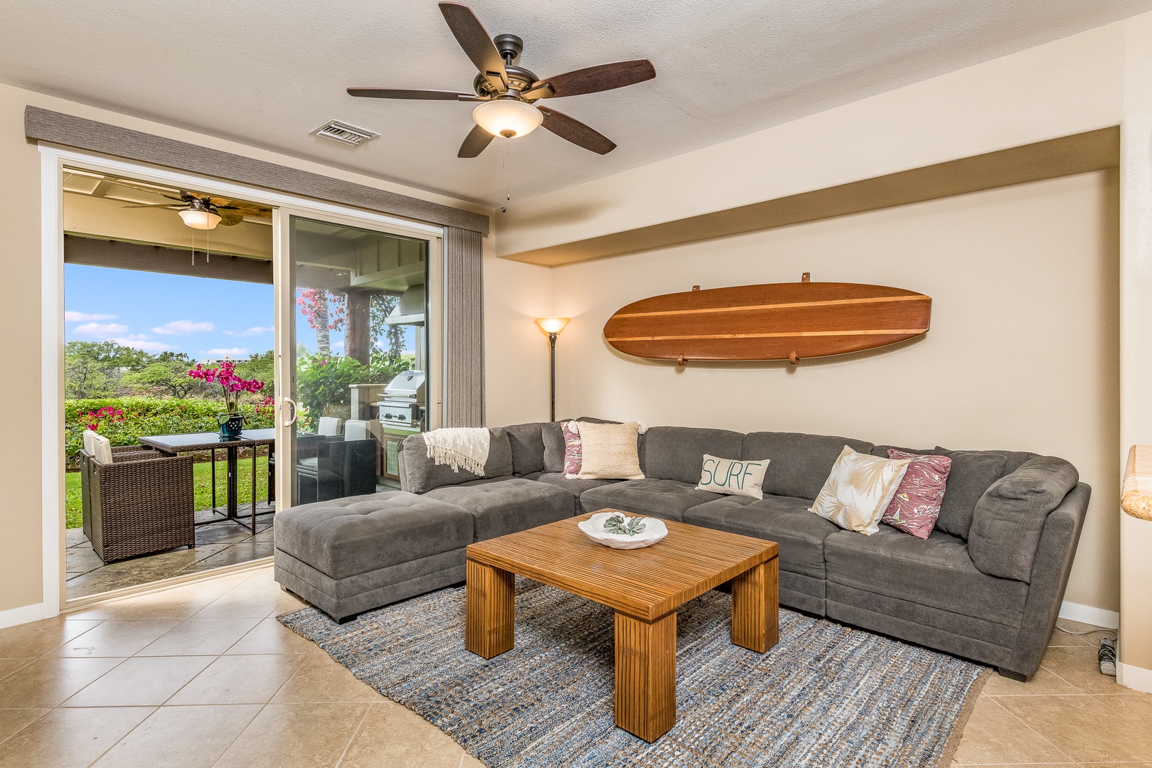 Kamuela Vacation Rentals, Palm Villas E1 - The professionally decorated space is bathed in natural light, thanks to the large windows that frame the beautiful ocean view.