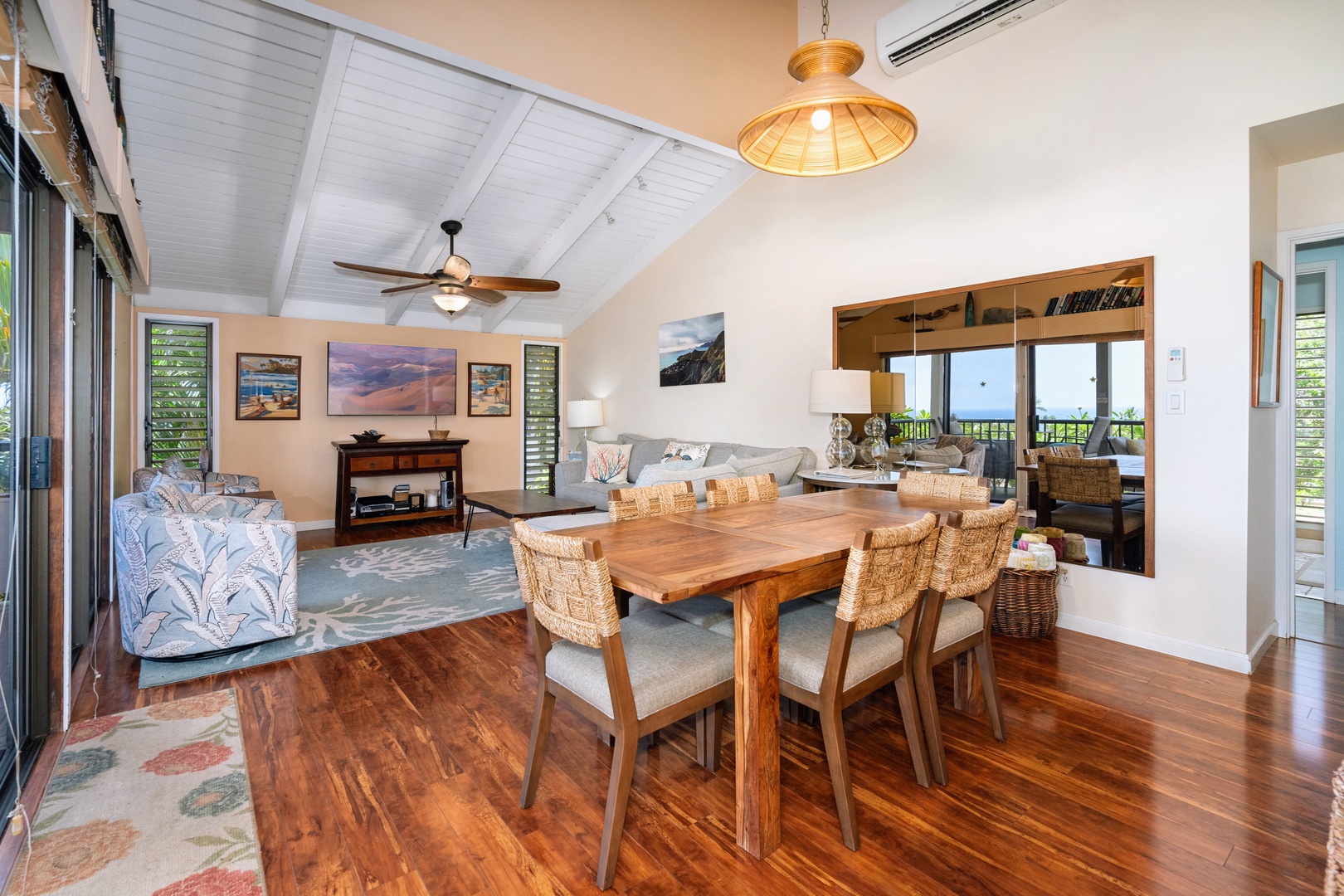 Kihei Vacation Rentals, Wailea Ekolu 204 - Six chairs around the dining table, and the ocean holds steady at the far end of the room.
