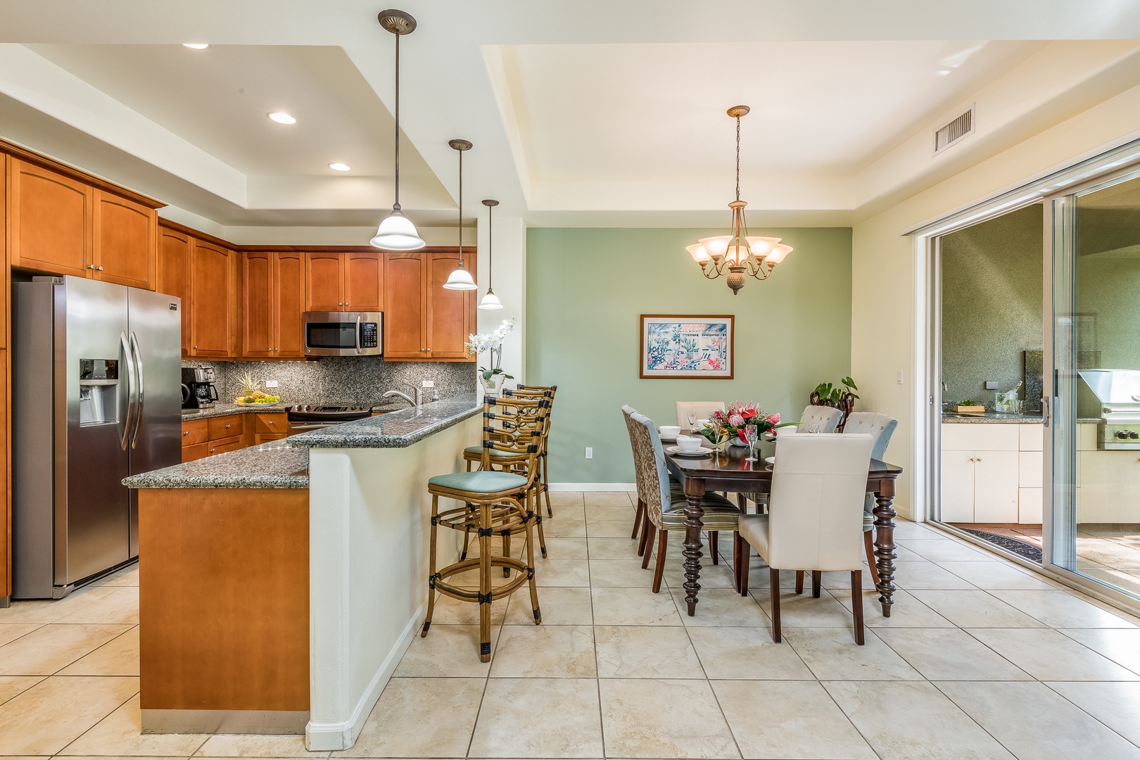 Kamuela Vacation Rentals, Mauna Lani Fairways #204 - Choose from a charming breakfast bar or elegant indoor table—every meal is elevated by the relaxed island atmosphere.
