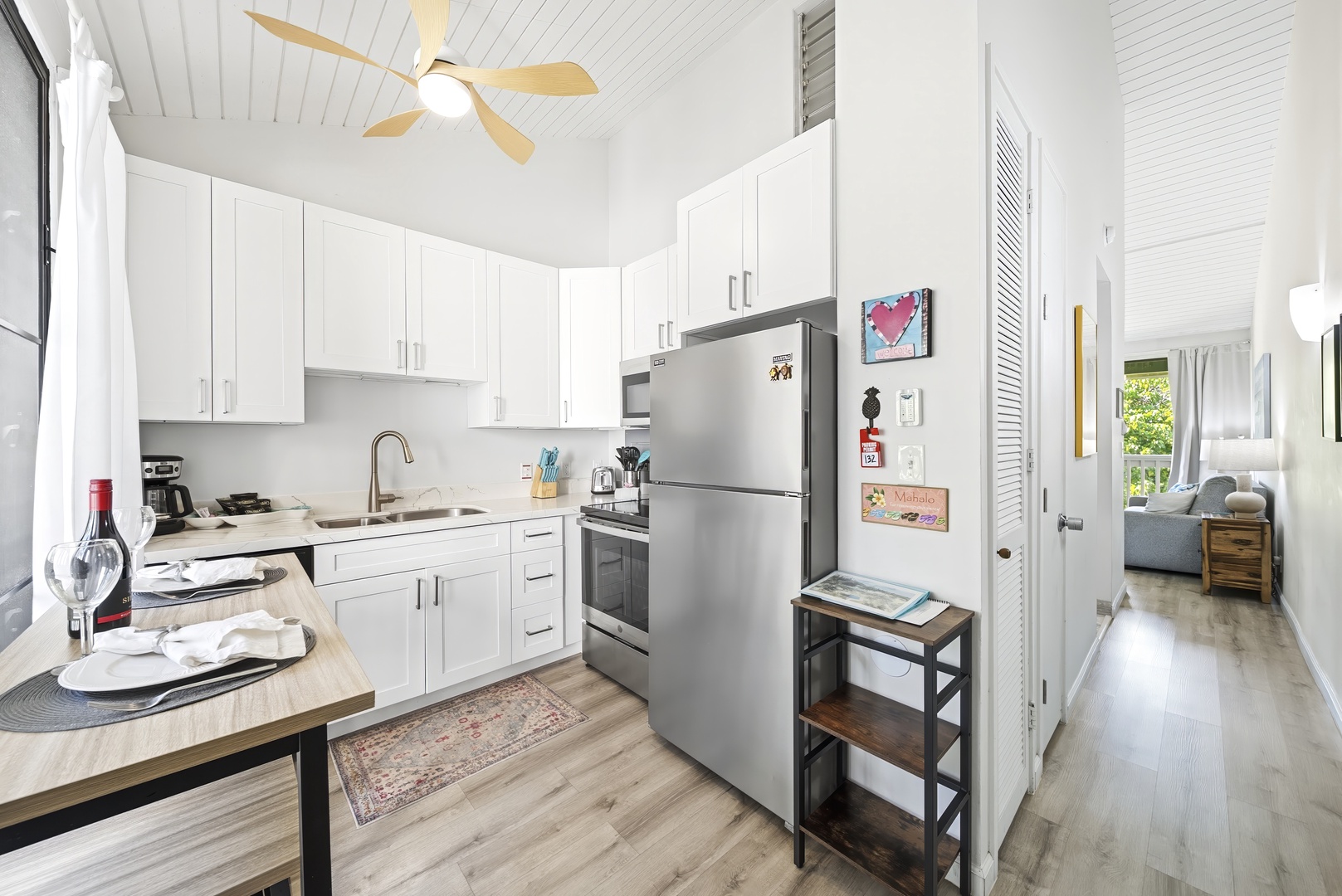 Kahuku Vacation Rentals, Kuilima Estates West #132 - White cabinets and full-size appliances make simple meals easy between beach days.