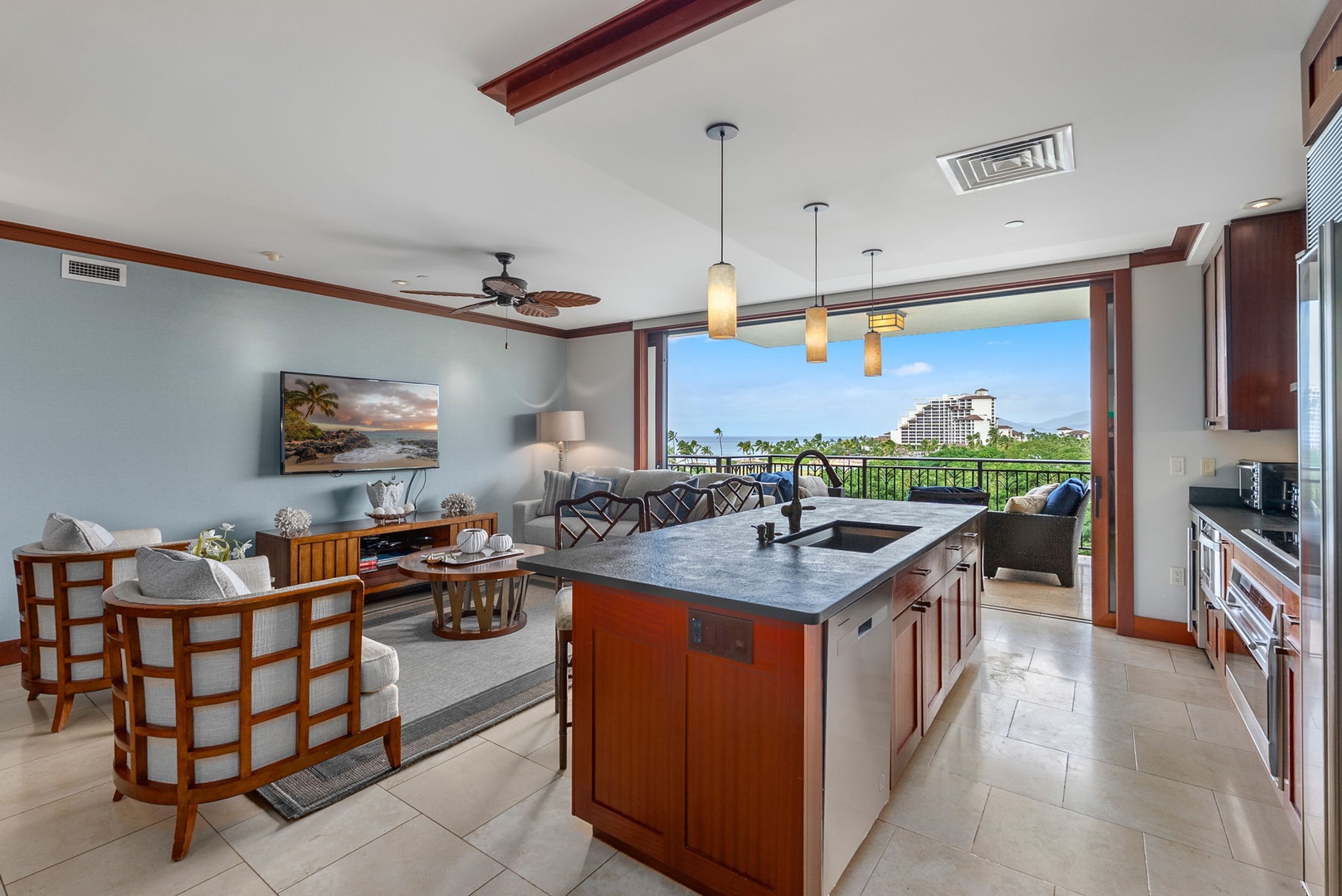 Kapolei Vacation Rentals, Ko Olina Beach Villas B604 - Enjoy preparing meals in your open kitchen while taking in stunning views through floor-to-ceiling windows of this elegantly appointed space.