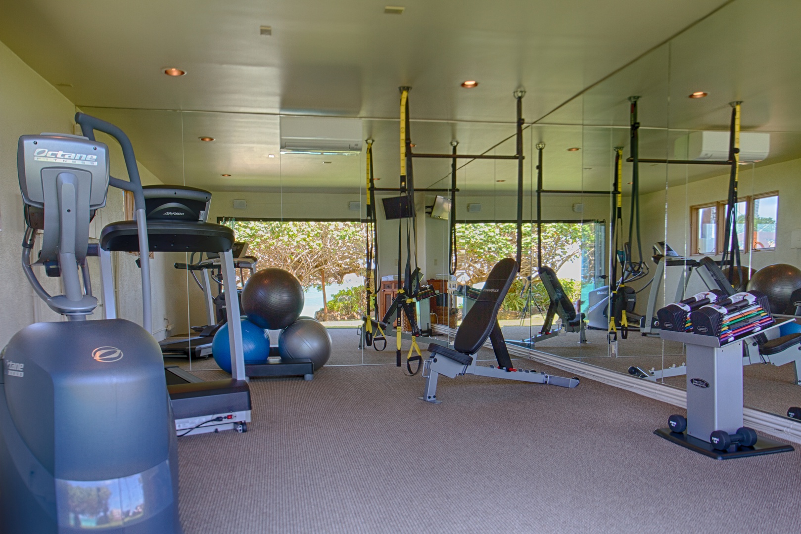 Kailua Vacation Rentals, Paul Mitchell Estate* - Gym with glass sliding doors and full ocean view