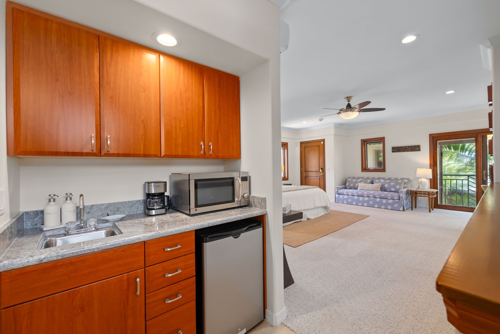 Honolulu Vacation Rentals, Maunalua Estate - A thoughtfully designed kitchenette adds comfort and convenience for extended island stays.