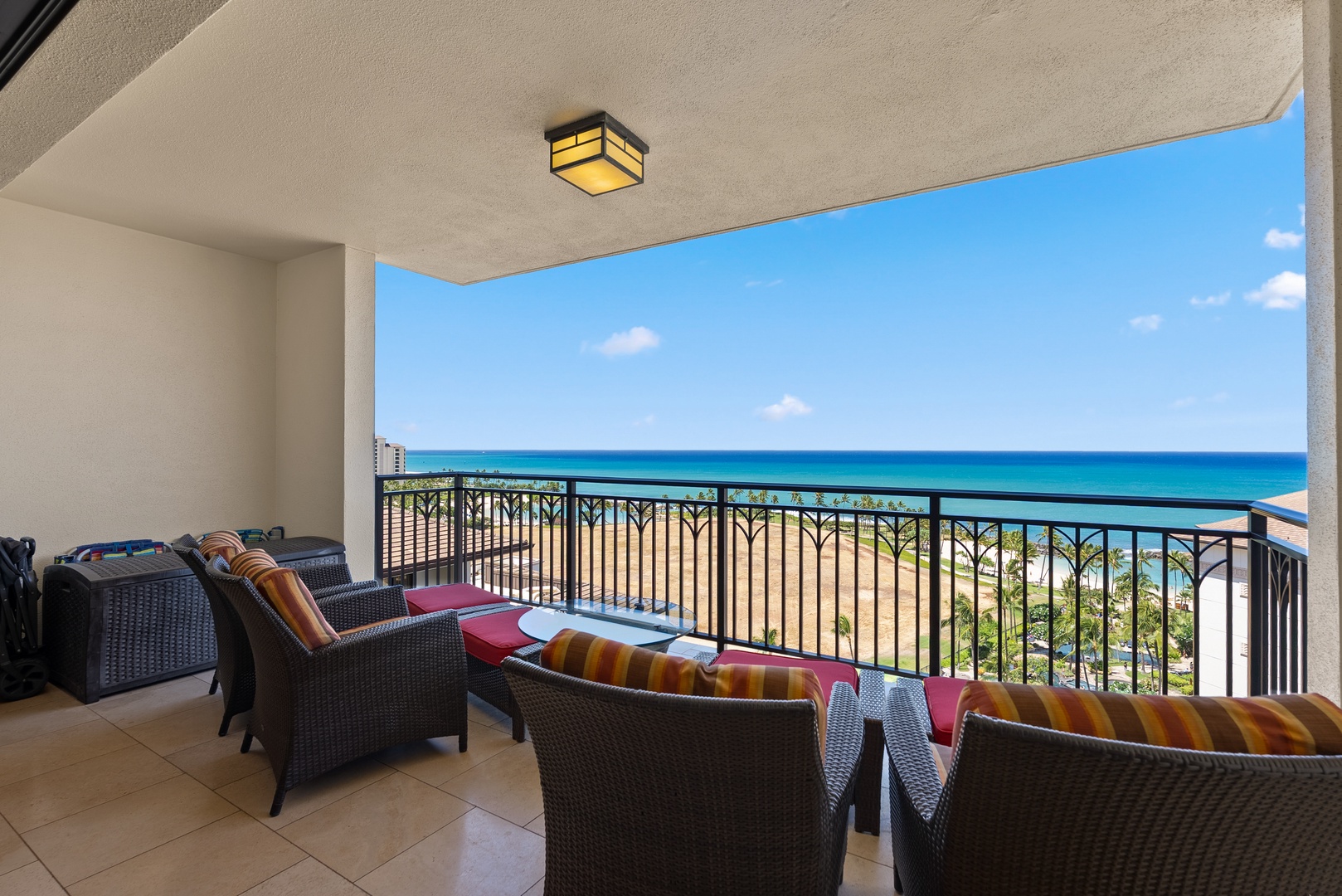 Kapolei Vacation Rentals, Ko Olina Beach Villas O1404 - Settle onto the shaded lanai, the ocean opening wide the full width of the rail.