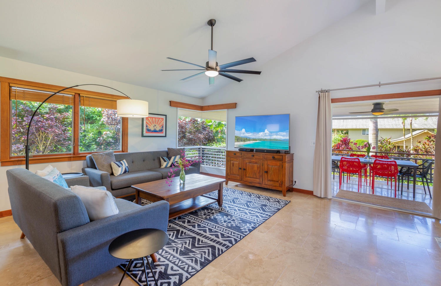Princeville Vacation Rentals, Makana Lei - Living space with covered lanai beyond