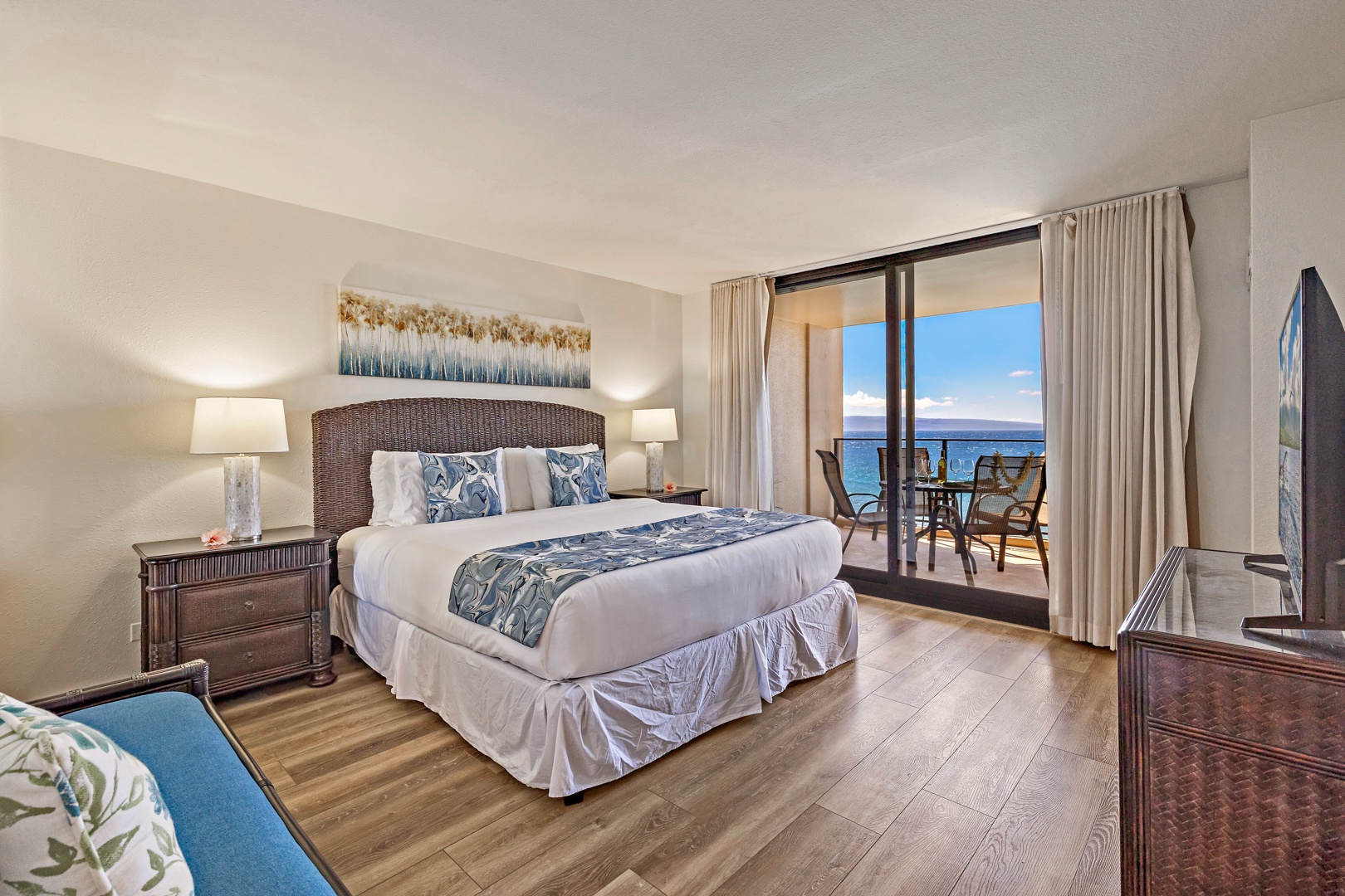 Lahaina Vacation Rentals, Mahana 718 - Wake to ocean views from the king bed and lanai at Mahana 718.