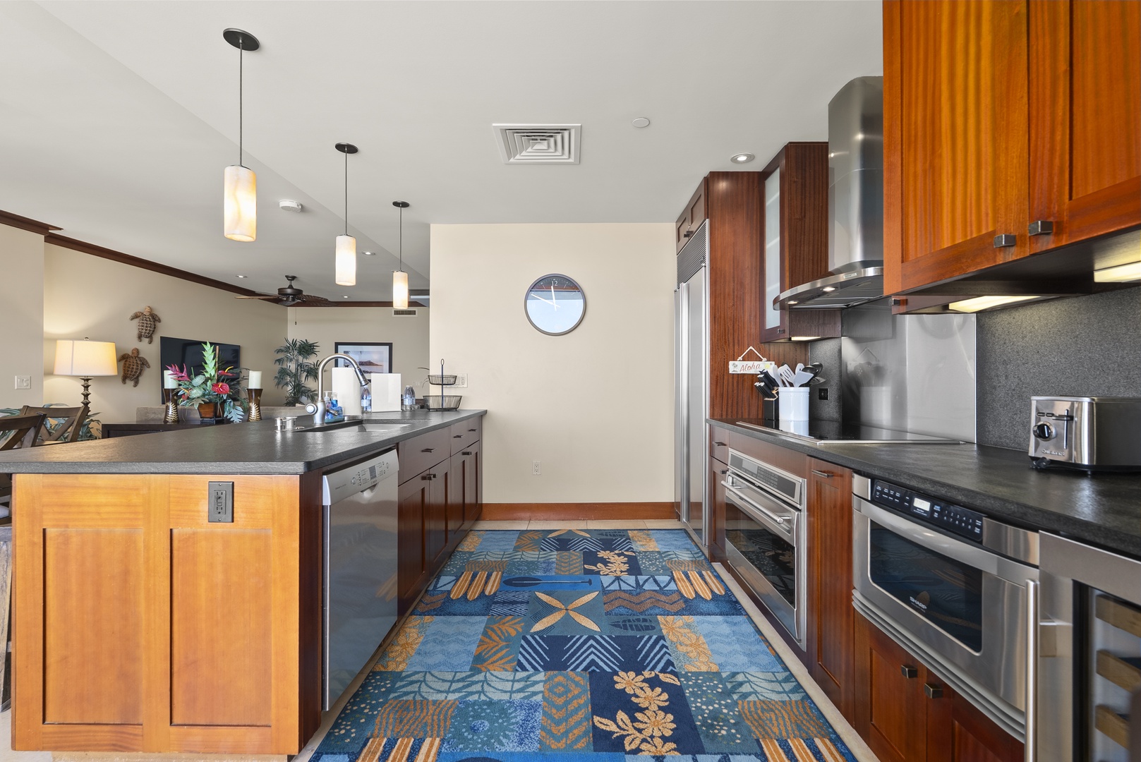 Kapolei Vacation Rentals, Ko Olina Beach Villas O1404 - Full stainless range and a run of counter, built for real cooking after a beach day.