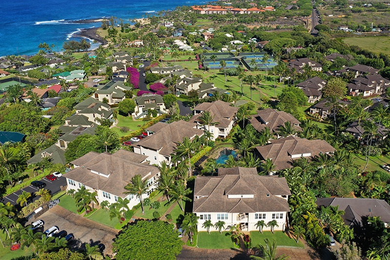 Koloa Vacation Rentals, Villas at Poipu Kai B111 - Aerial view of the resort community, showcasing its proximity to the beach and lush surroundings.