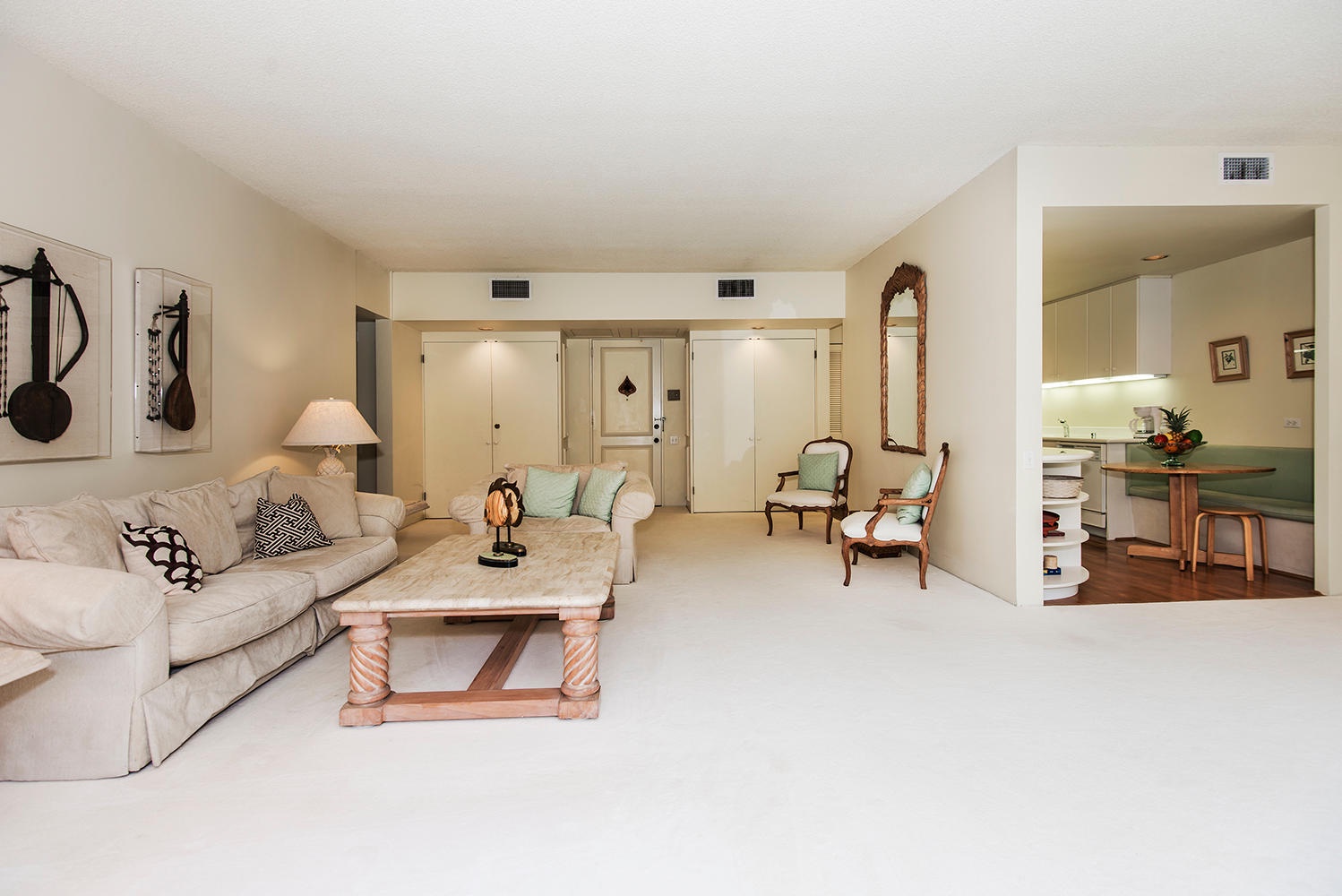 Honolulu Vacation Rentals, Kahala Beachfront Villa - Relax in the spacious living area with comfortable seating and elegant decor.