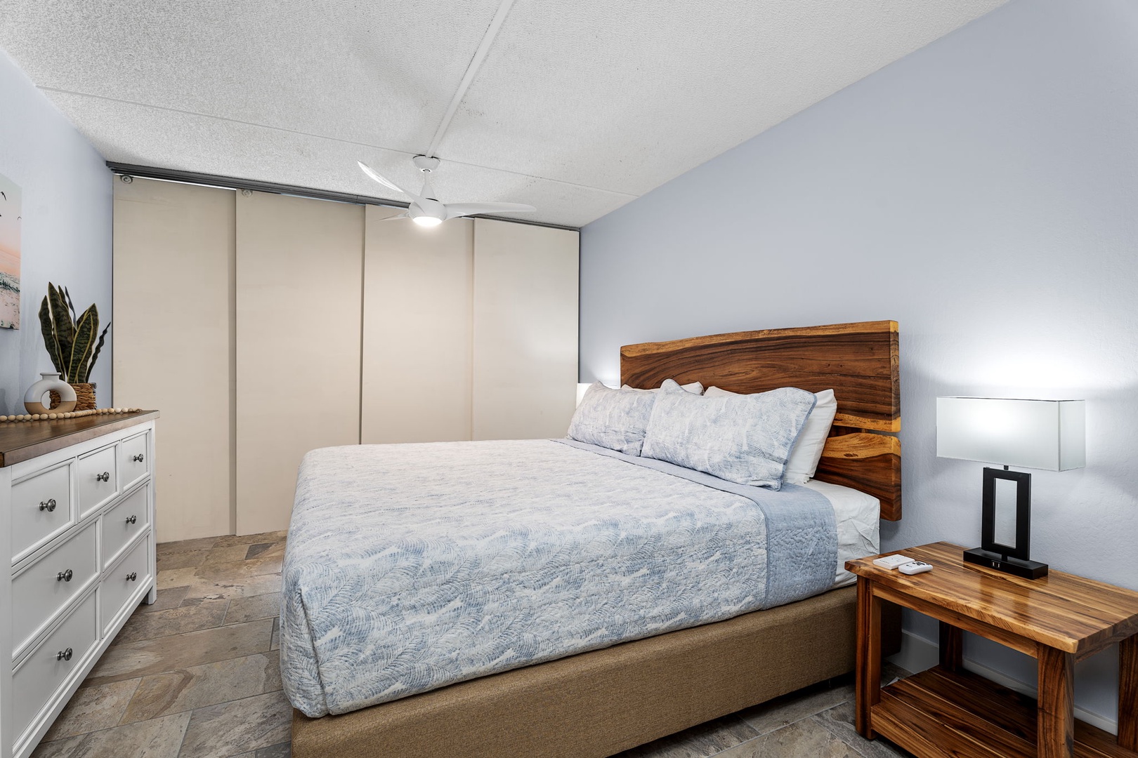 Kailua Kona Vacation Rentals, Kona Pacific C416 - Spacious bedroom with a large closet and a calming ambiance. (doors to bonus room closed)