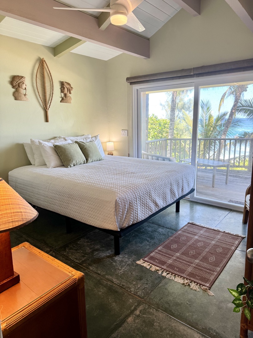 Hanalei Vacation Rentals, Hale Kepuhi TVNC #5156 - Relax in the bright queen bedroom with vaulted ceilings and step out to the private lanai to enjoy tropical views and fresh island air.