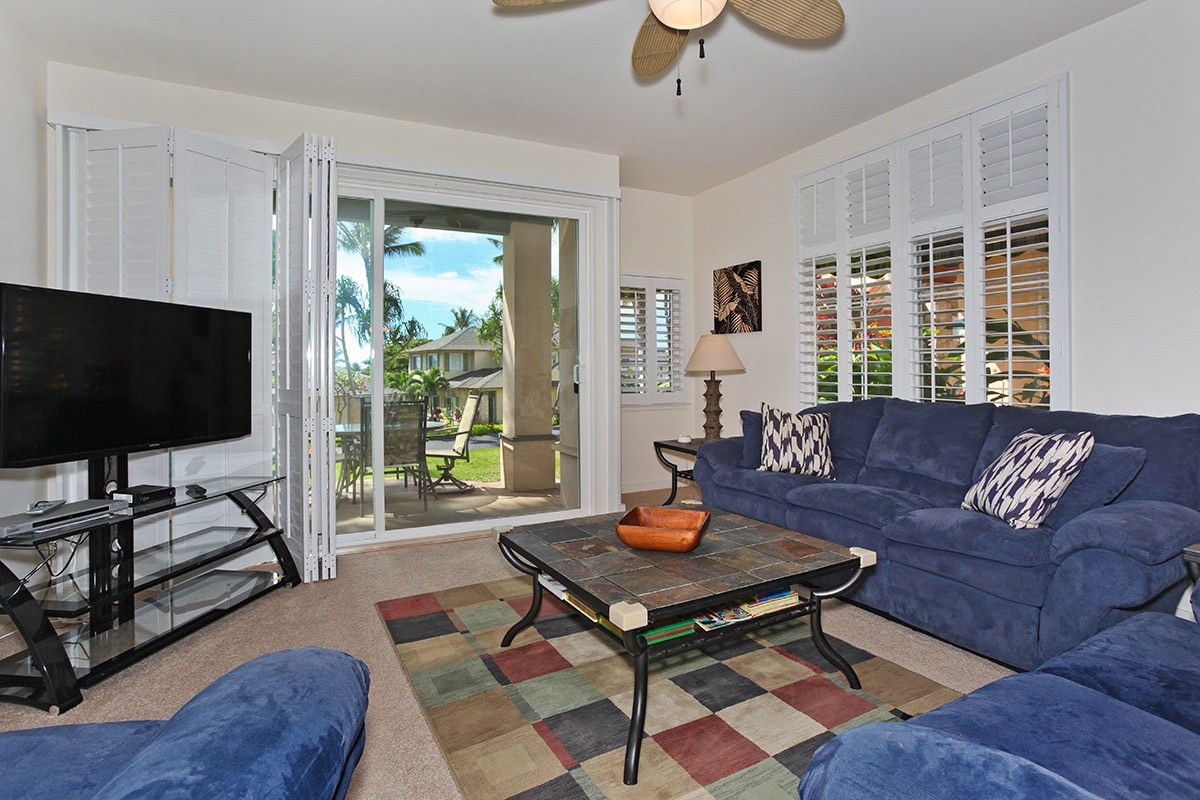 Kapolei Vacation Rentals, Kai Lani 12D - Relax with a book, movie night on TV or take in the captivating scenery.