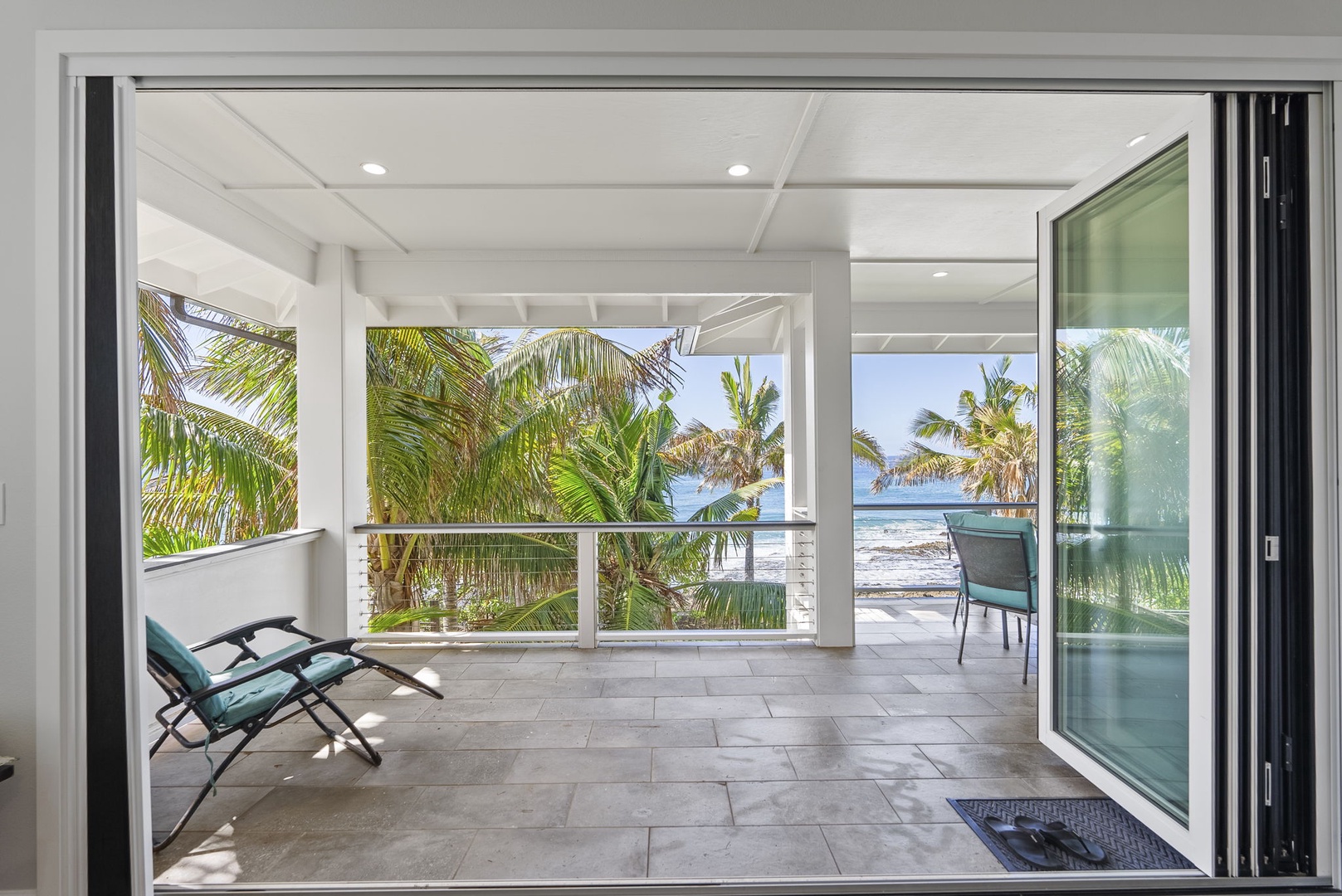 Waianae Vacation Rentals, Oceanfront Luxury Dream Estate - Oceanfront lanai with uninterrupted views and shaded seating—perfect for morning meditation.