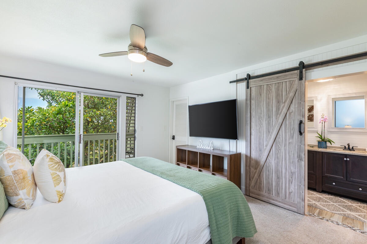 Princeville Vacation Rentals, Hale Hana Mana’o - Slide into island time in this airy suite with barn door access to a modern ensuite bath.