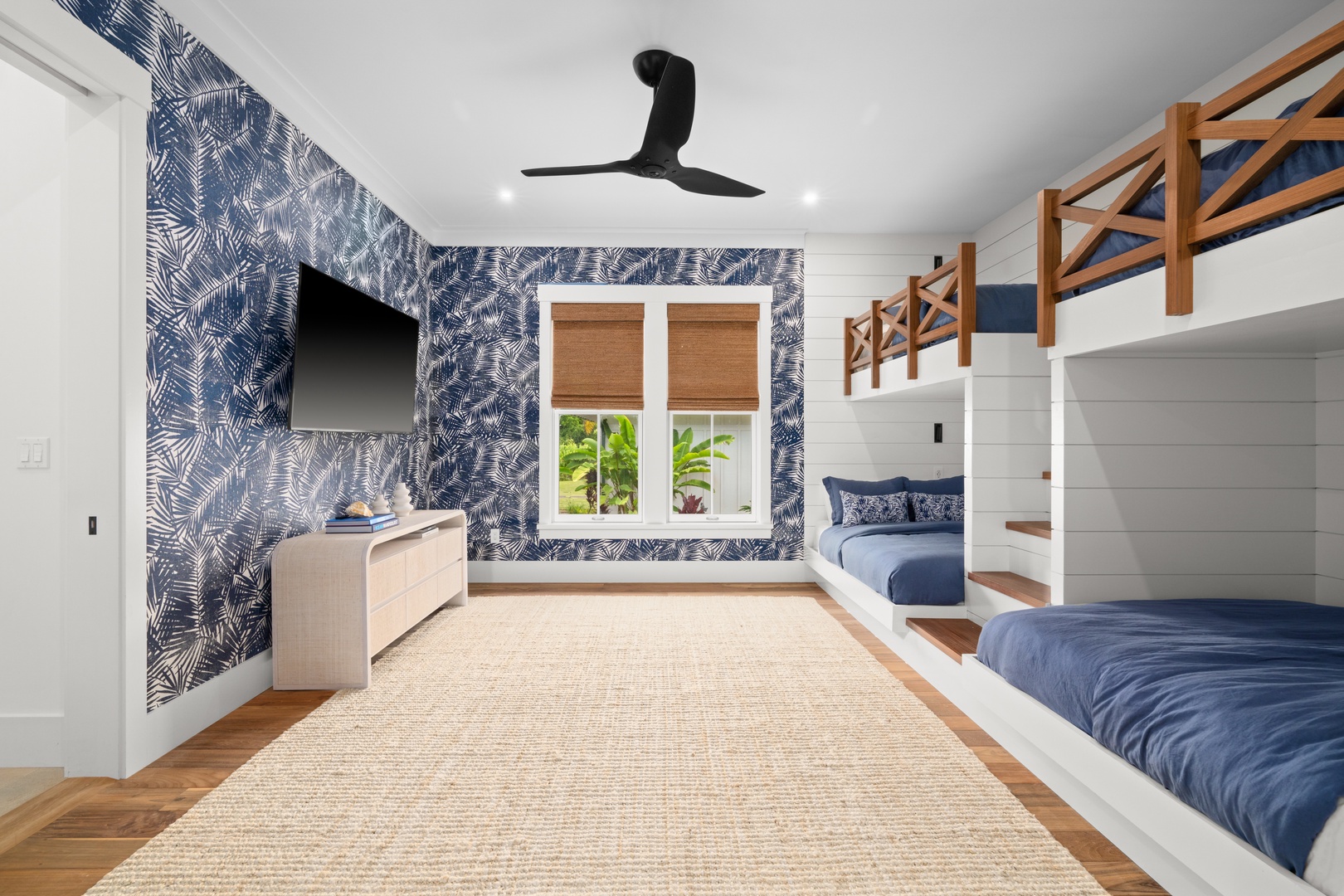Koloa Vacation Rentals, Makani Kai - The bunk room comes with its own TV and a wall of coastal blue.