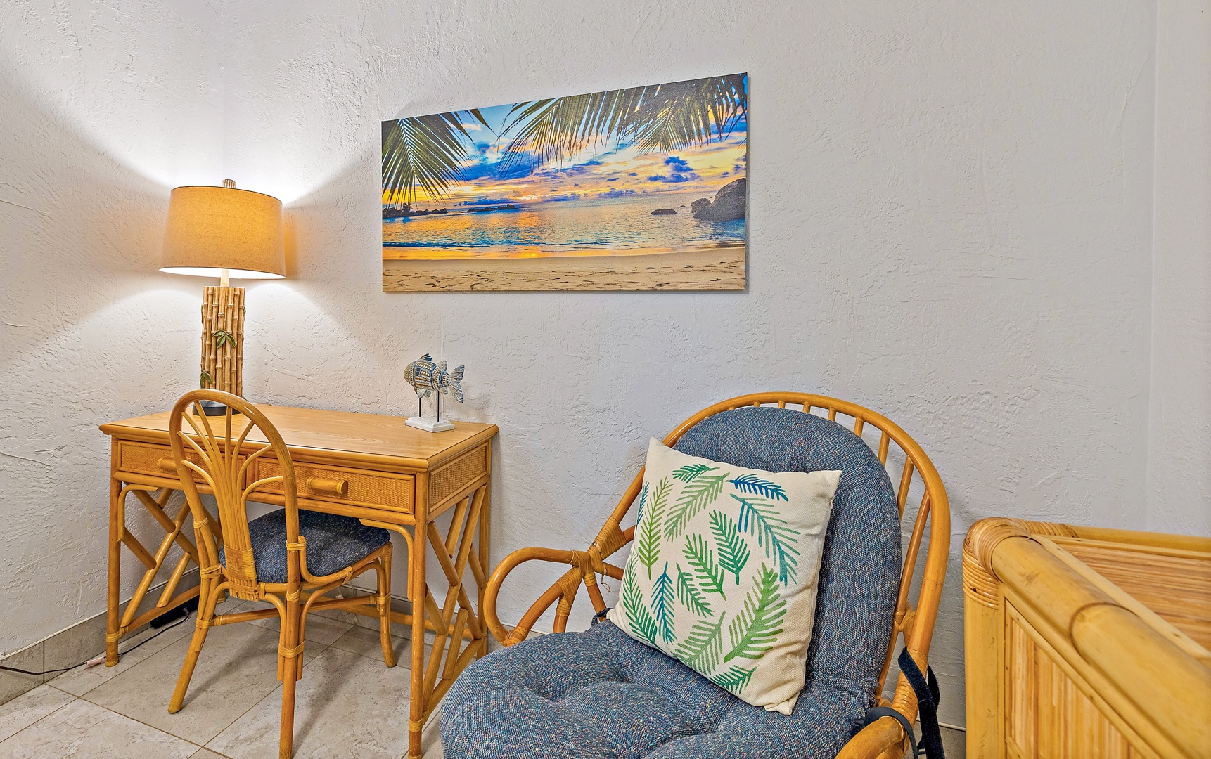 Lahaina Vacation Rentals, Papakea K-105 - This cozy corner offers a comfortable seating area and a small desk, perfect for catching up on work or simply relaxing with a book.