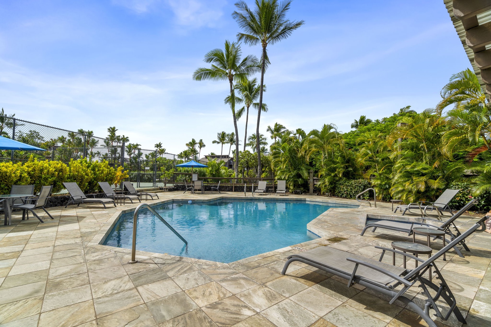 Kailua Kona Vacation Rentals, Kanaloa at Kona 701 - Sparkling pool surrounded by swaying palms creates your perfect tropical escape, with comfortable loungers ready for endless relaxation.