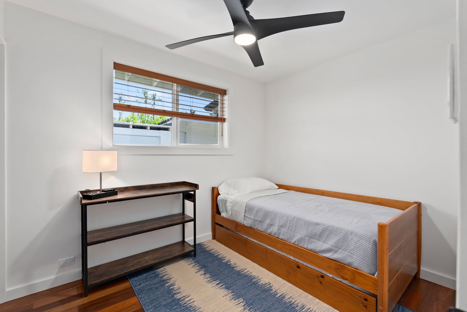 Waialua Vacation Rentals, Mokuleia Beach Villa** - The third guest bedroom has a twin trundle bed and ceiling fan.