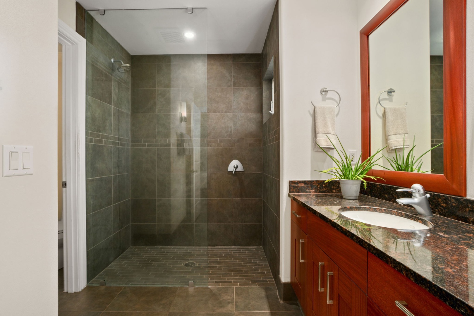 Princeville Vacation Rentals, Kaiulani #8 - Tile runs floor to ceiling in the walk-in shower, the kind of finish you notice on day one.