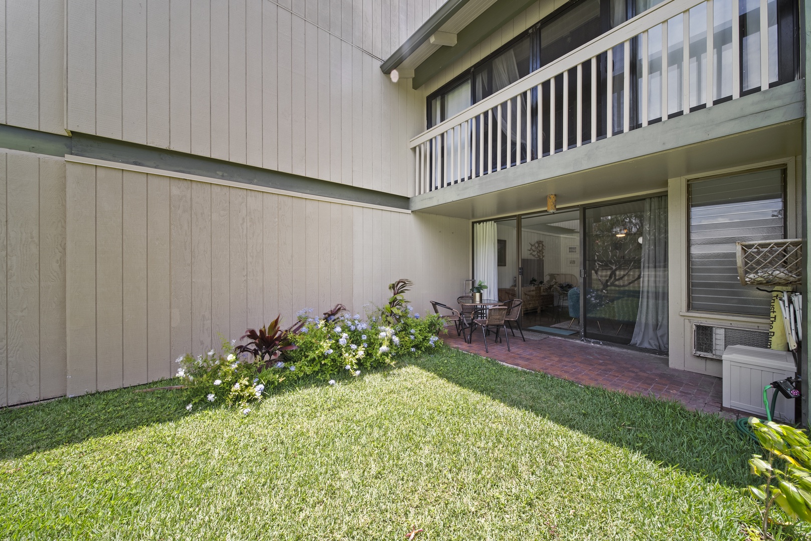 Kahuku Vacation Rentals, Pulelehua Kuilima Estates West #142 - Enjoy the bedroom's private lanai.