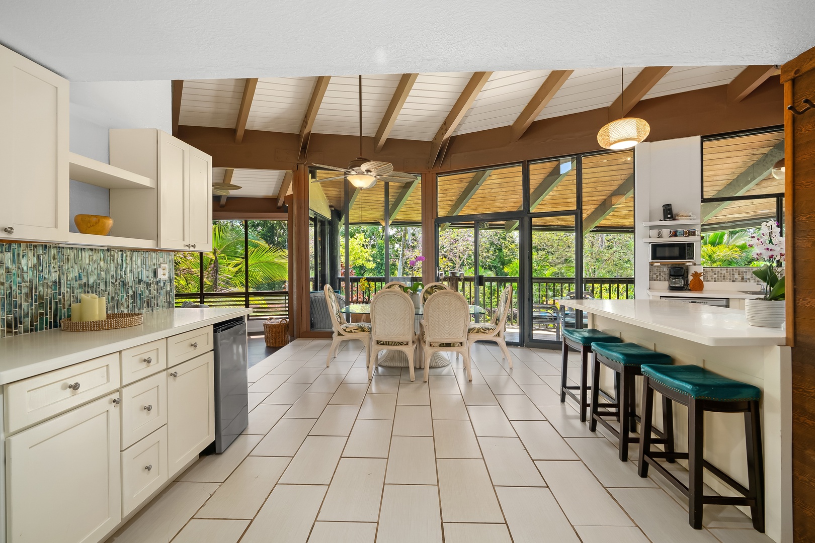 Princeville Vacation Rentals, Mauna Kai 7B - Coffee at the counter while the trees outside do the waking-up for you.